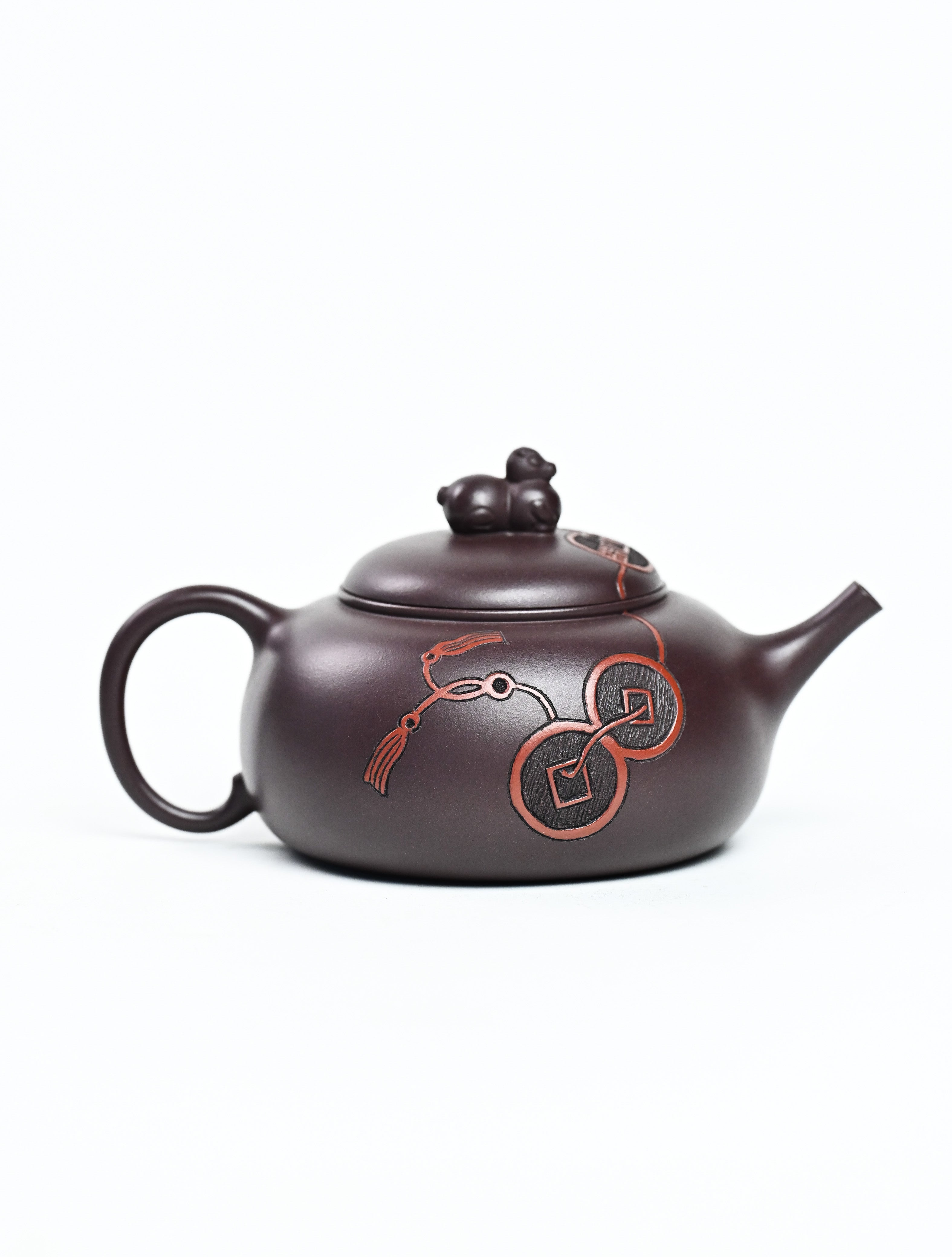 YANYOO handmade Yixing teapot featuring Zini clay and ancient Chinese coin sculpture, product right side.