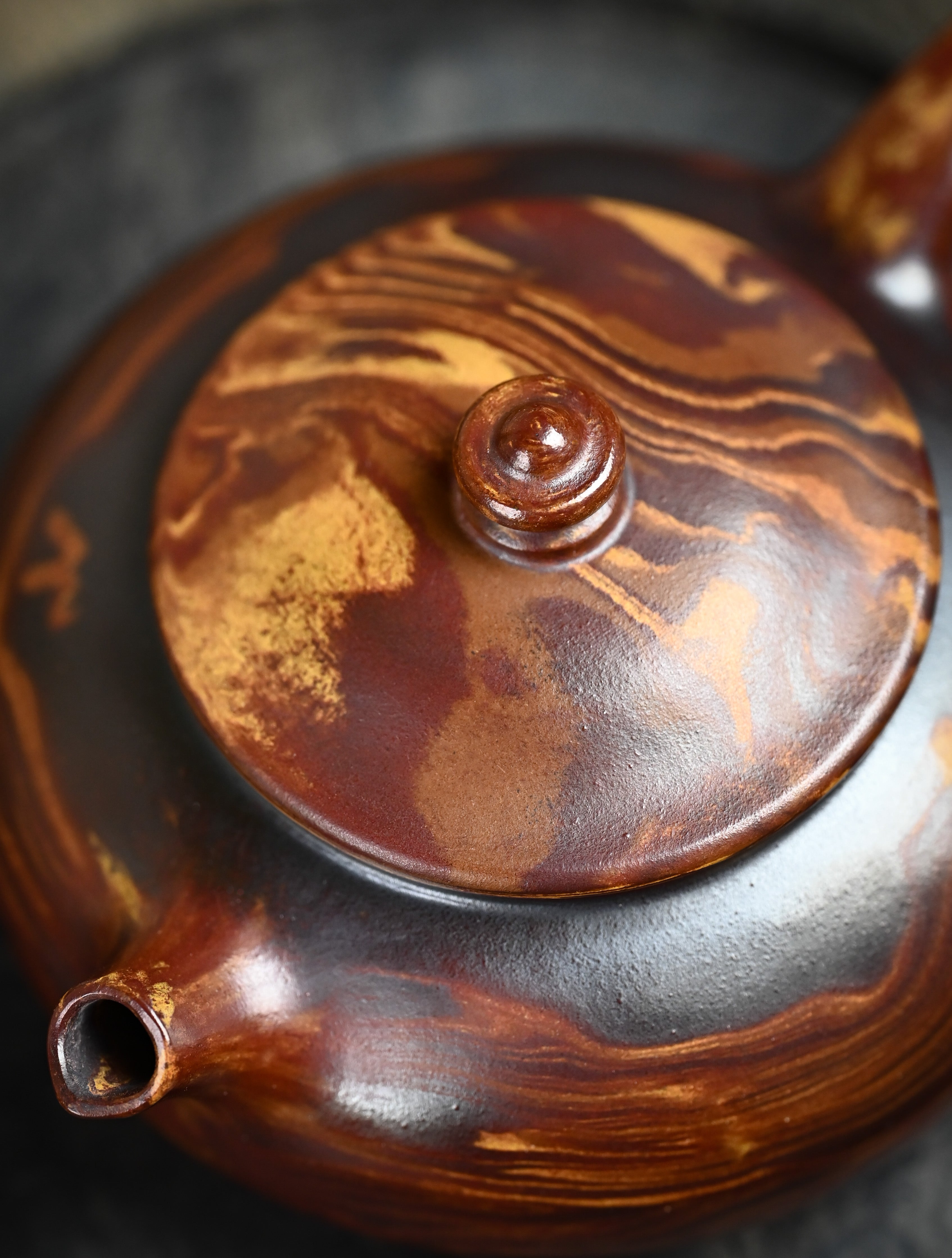 YANYOO handmade Yixing teapot featuring signature Wuni clay and Zisha clay blending technique, Han Jiang, lifestyle top side.