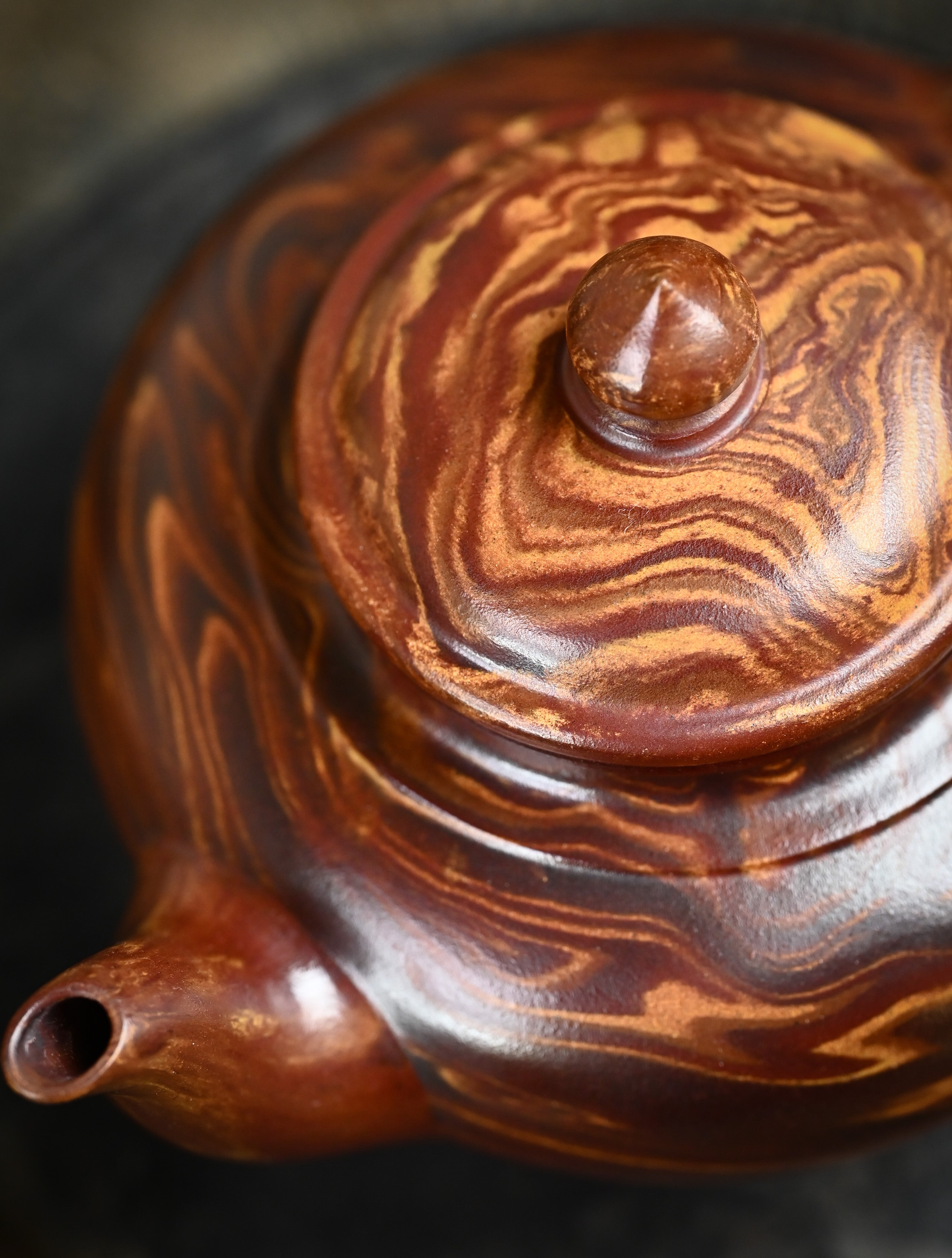YANYOO handmade Yixing teapot featuring signature Wuni clay and Zisha clay blending technique, Xiao Ying, lifestyle detail top side.