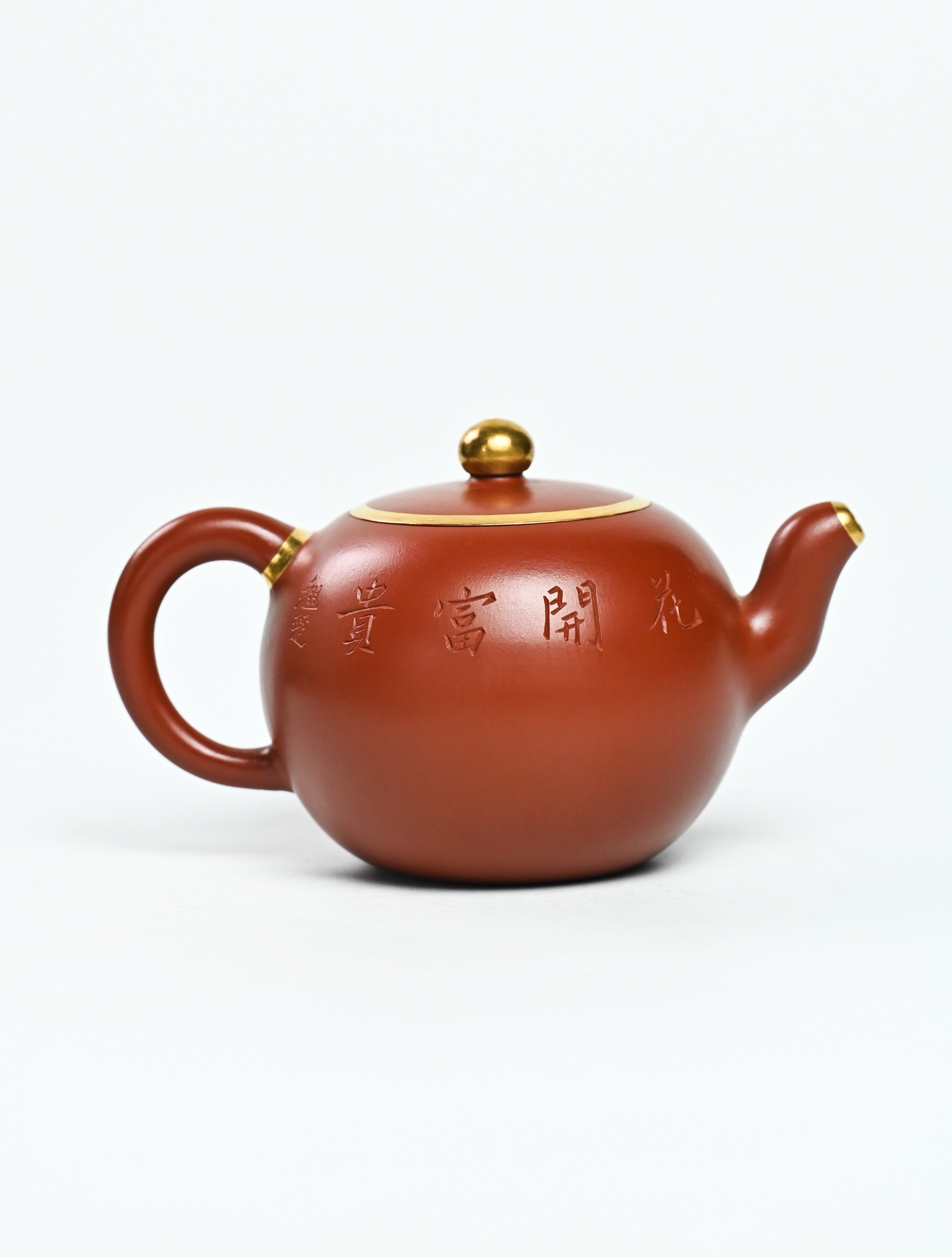 YANYOO handmade Yixing teapot featuring premium Zhuni clay and relief engravings, product right side.