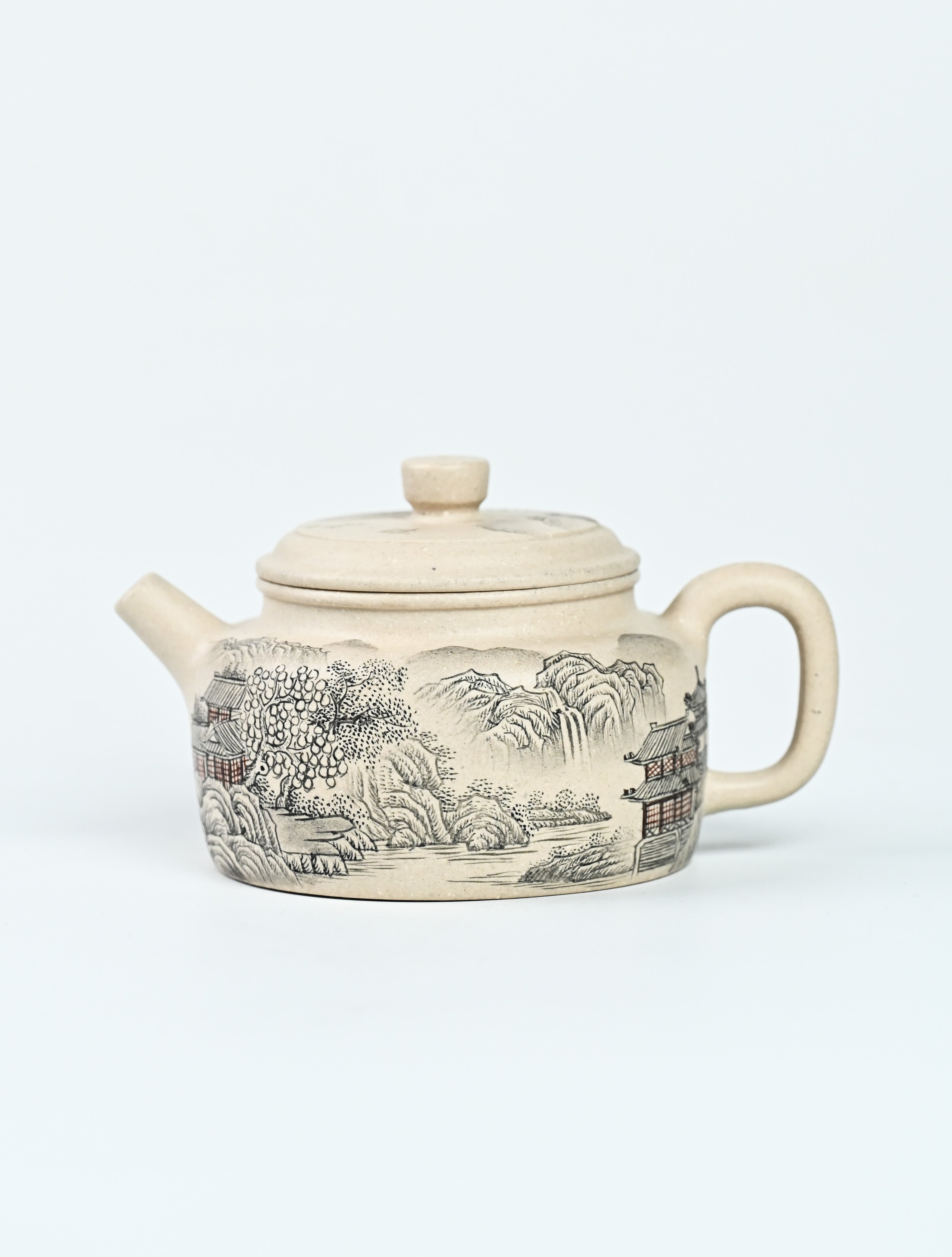 YANYOO handmade Yixing teapot featuring suet white jade Duanni clay and delicate ink painting technique from Jingdezhen China, product left side.