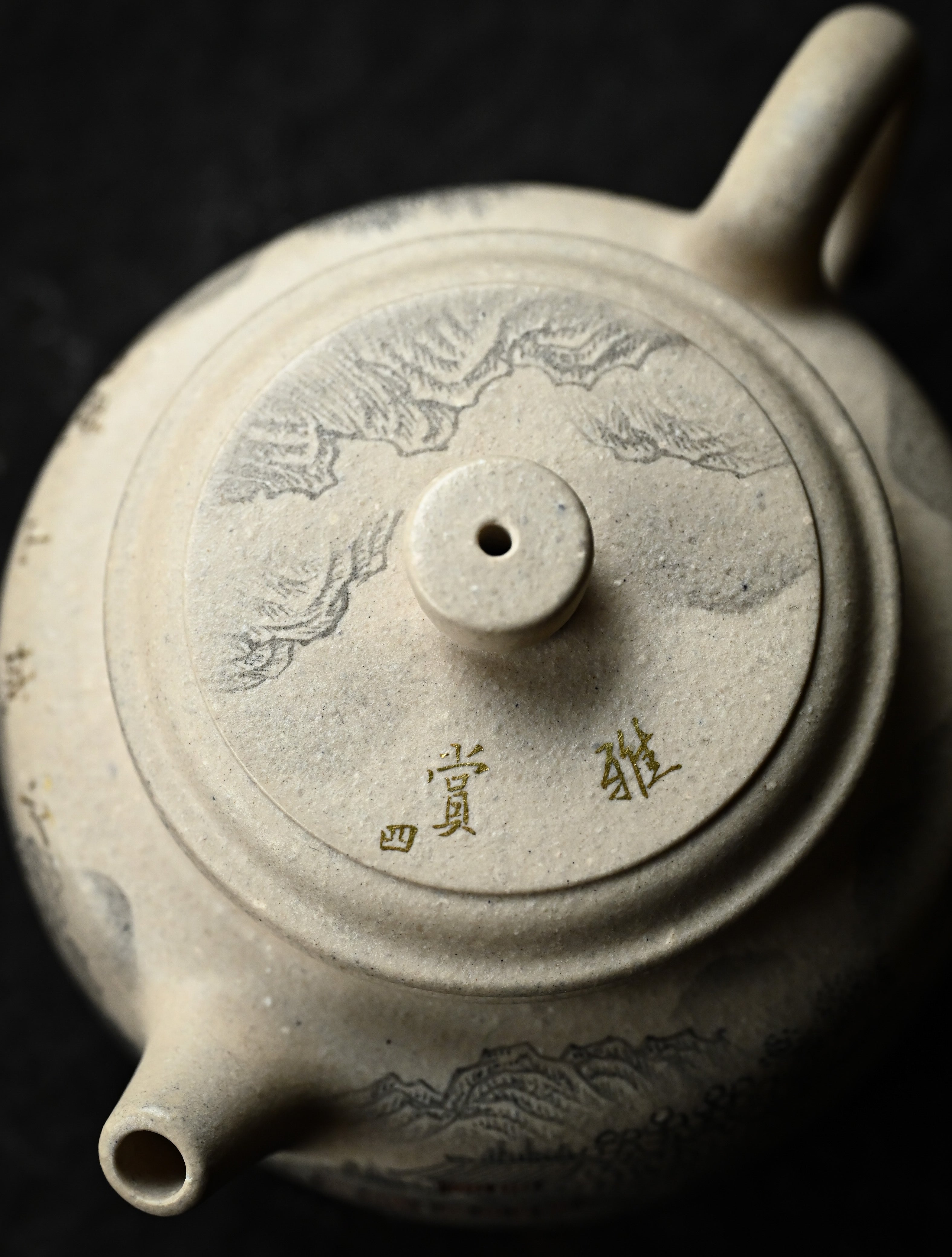YANYOO handmade Yixing teapot featuring suet white jade Duanni clay and delicate ink painting technique from Jingdezhen China, lifestyle top side.