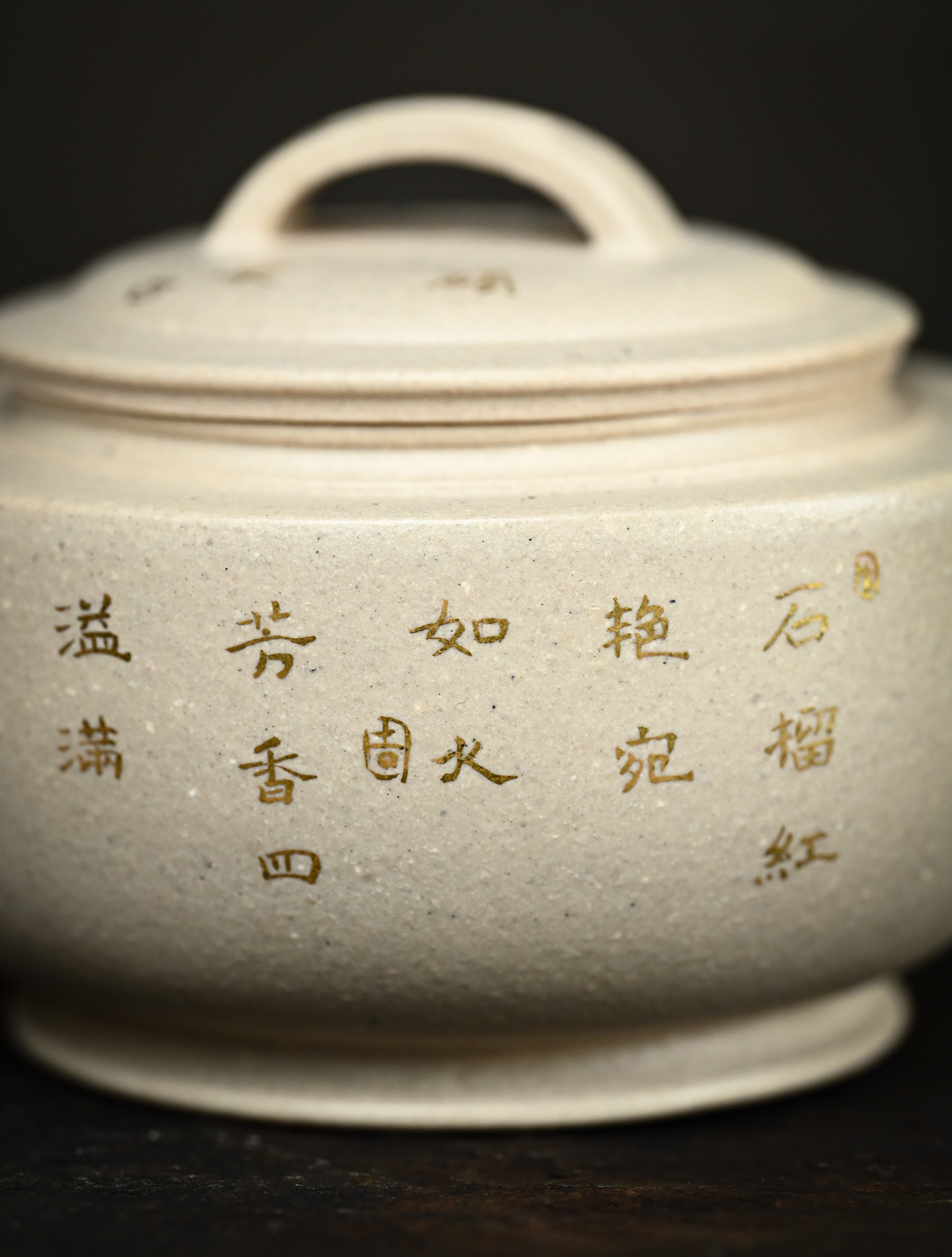 YANYOO handmade Yixing teapot featuring suet white jade Duanni clay and delicate bird-and-pomegranate themed clay painting, Gong Deng, lifestyle detail back side.