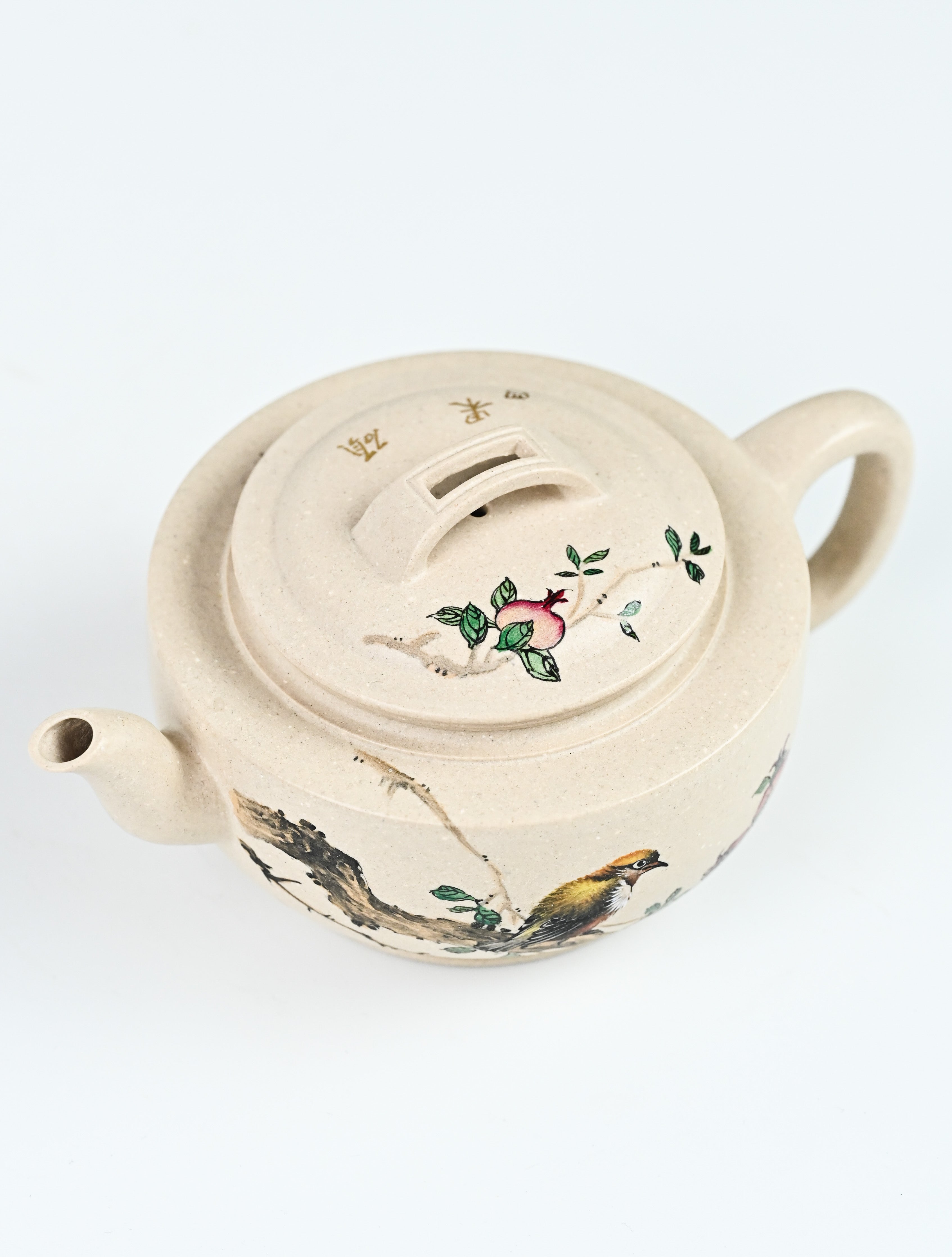 YANYOO handmade Yixing teapot featuring suet white jade Duanni clay and delicate bird-and-pomegranate themed clay painting, Gong Deng, product top side.