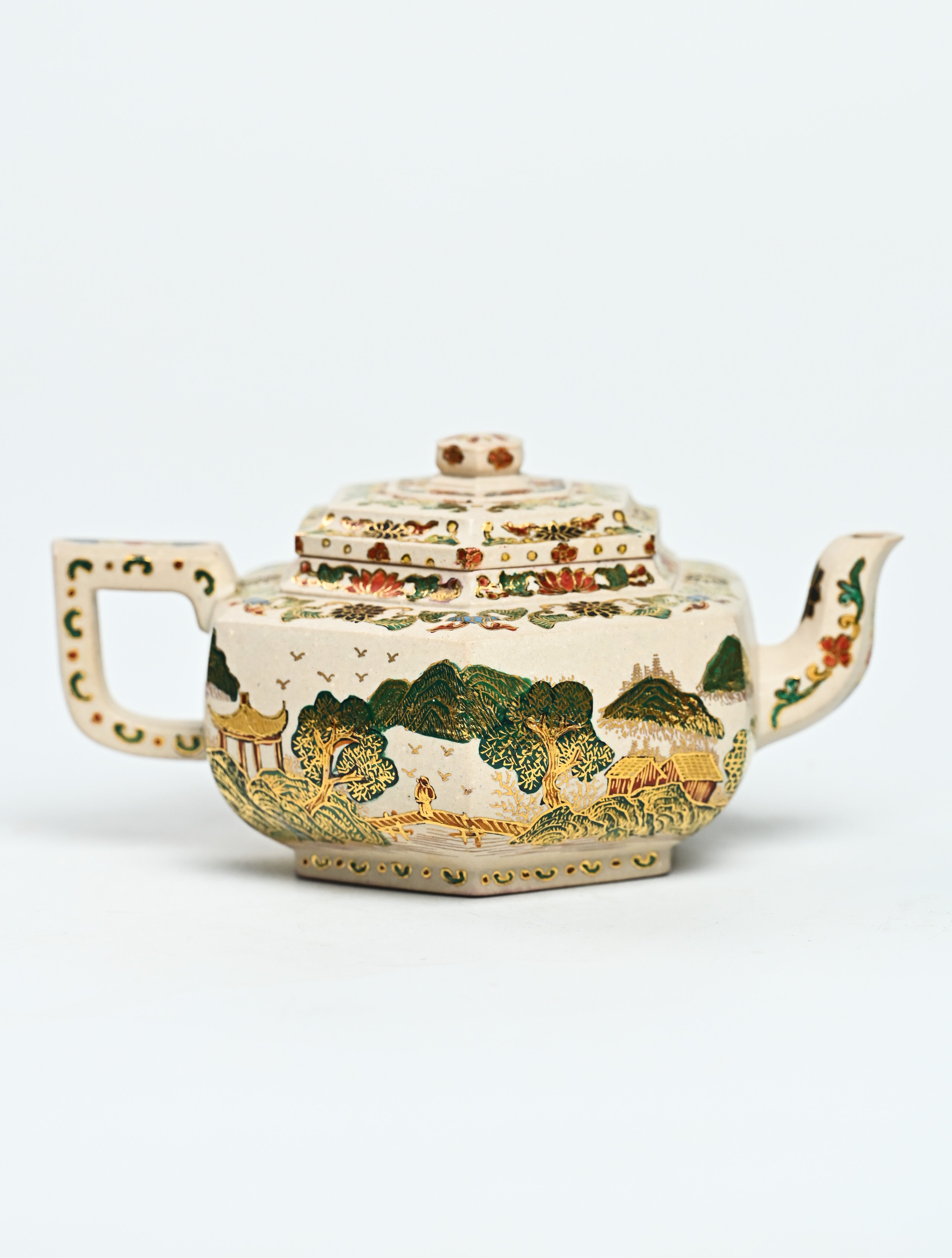 YANYOO handmade Yixing teapot featuring suet white jade Duanni clay and delicate Falangcai, product right side.