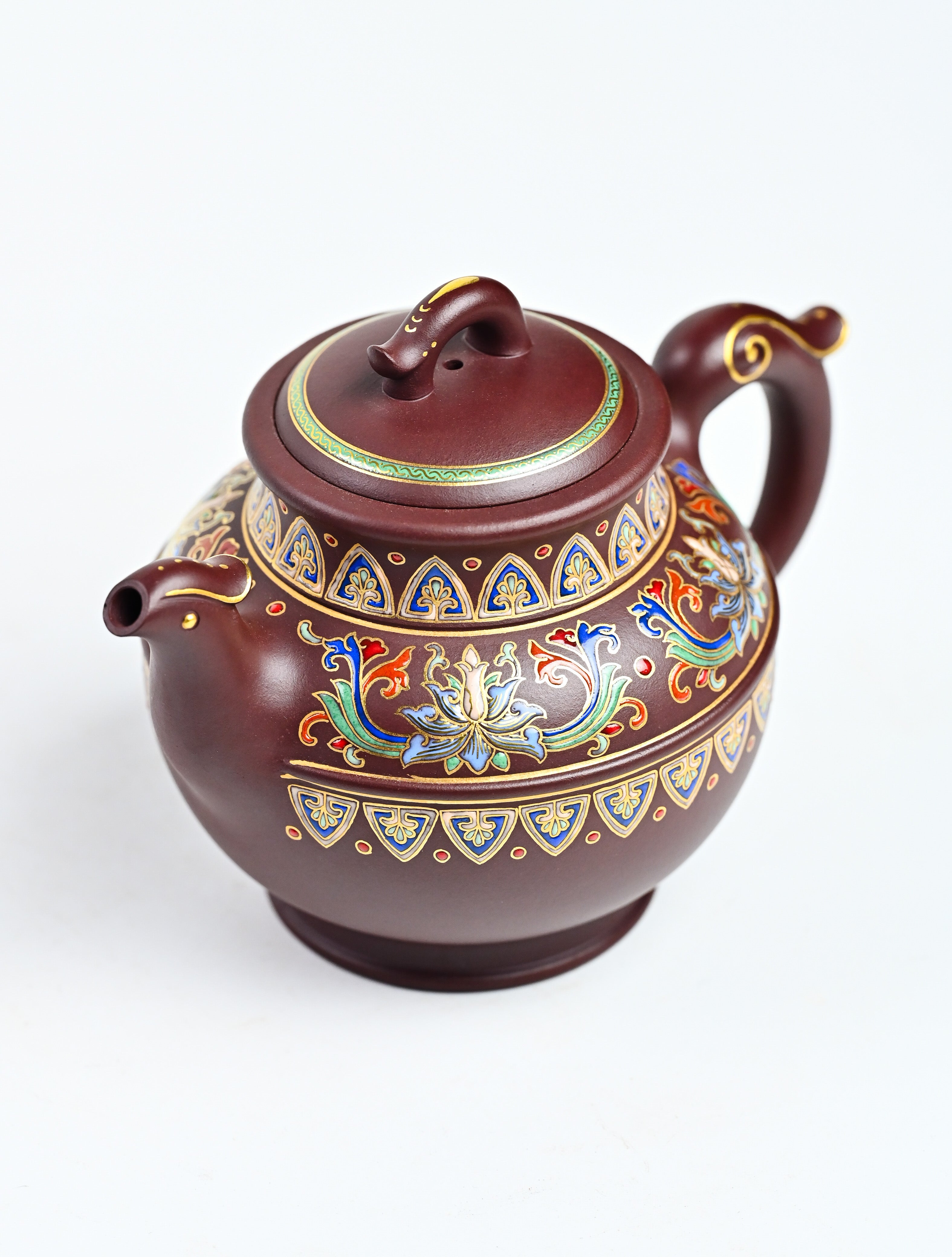 YANYOO handmade Yixing teapot featuring purple clay and lotus-themed Falangcai mimicing a phoenix, product top side.