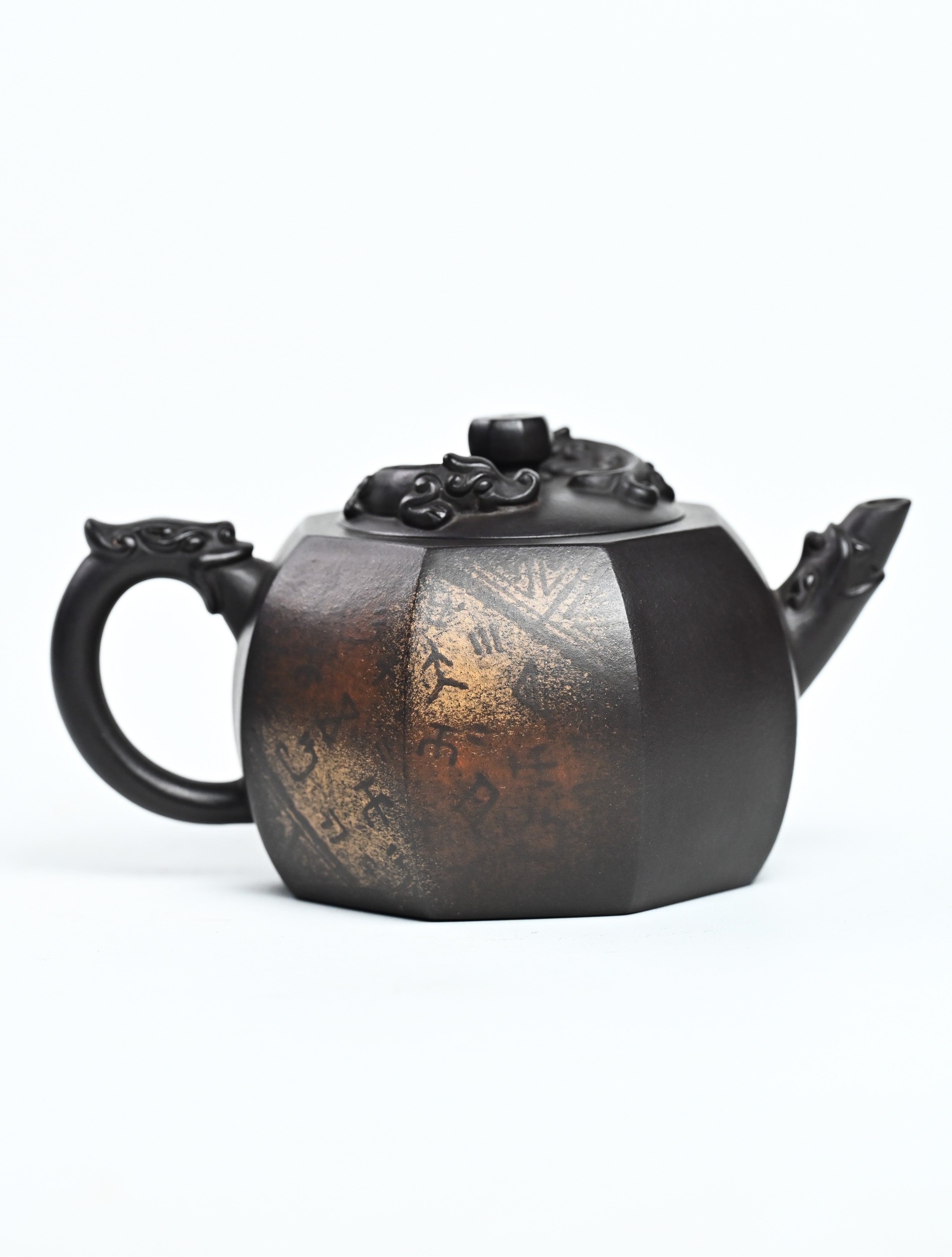 YANYOO handmade Yixing teapot featuring aged Celadon clay, Oracle Bone scripts pattern and the pioneering color decoration method, product right side.