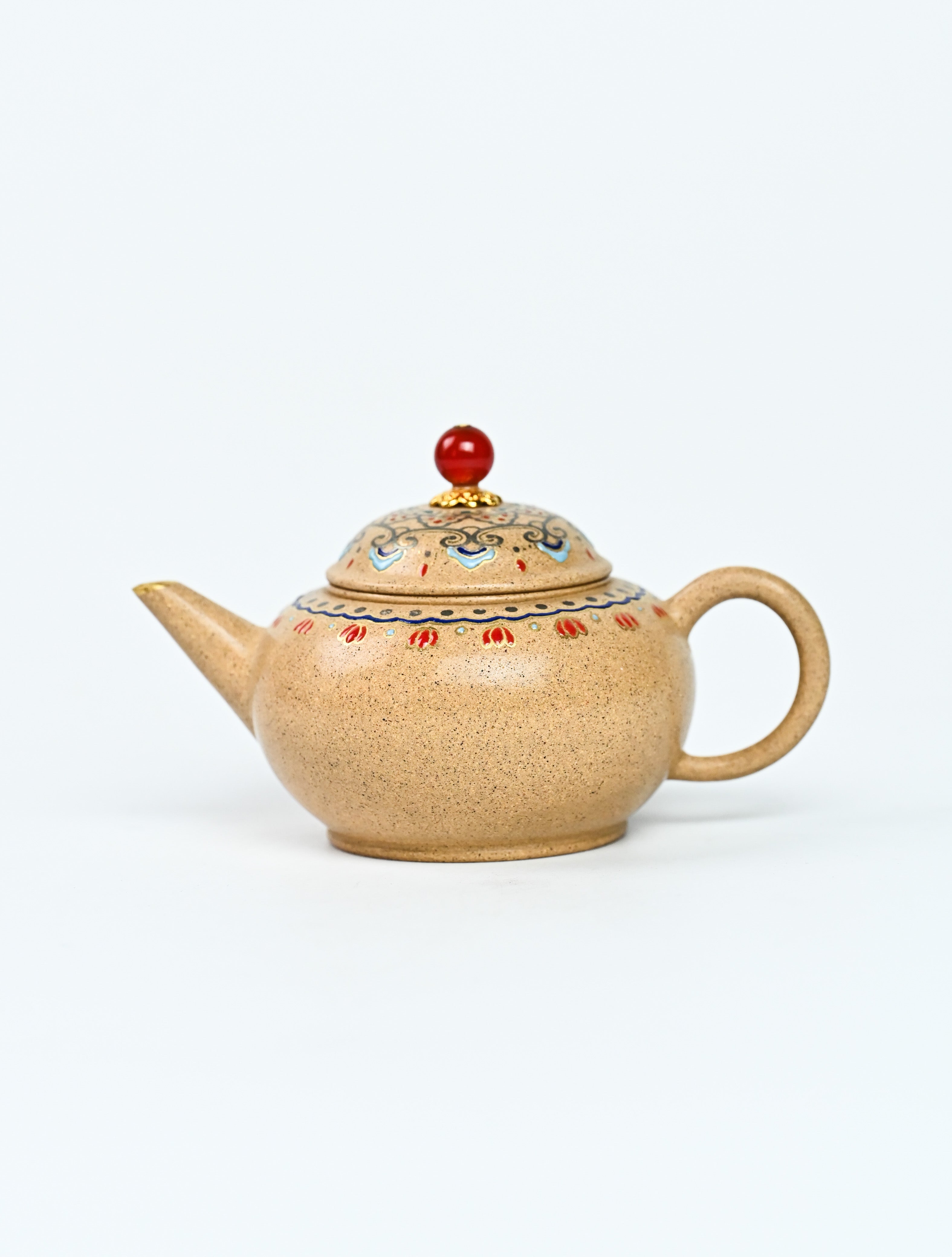 YANYOO handmade Yixing teapot featuring Duanni clay, Shuimo polish technique and delicate Falangcai, product left side.