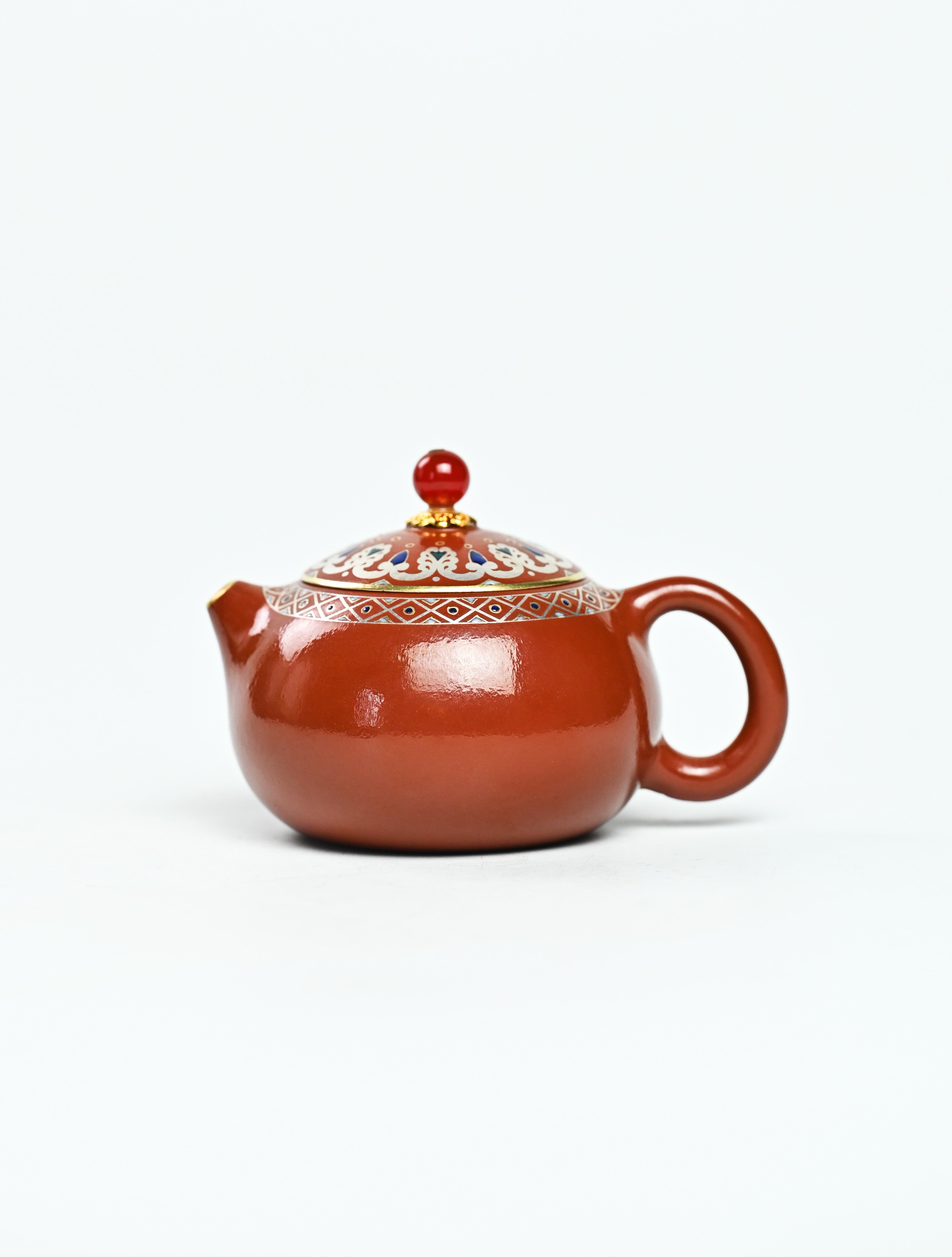 YANYOO handmade Yixing teapot featuring Shuimo polish technique and delicate Falangcai, product left side.