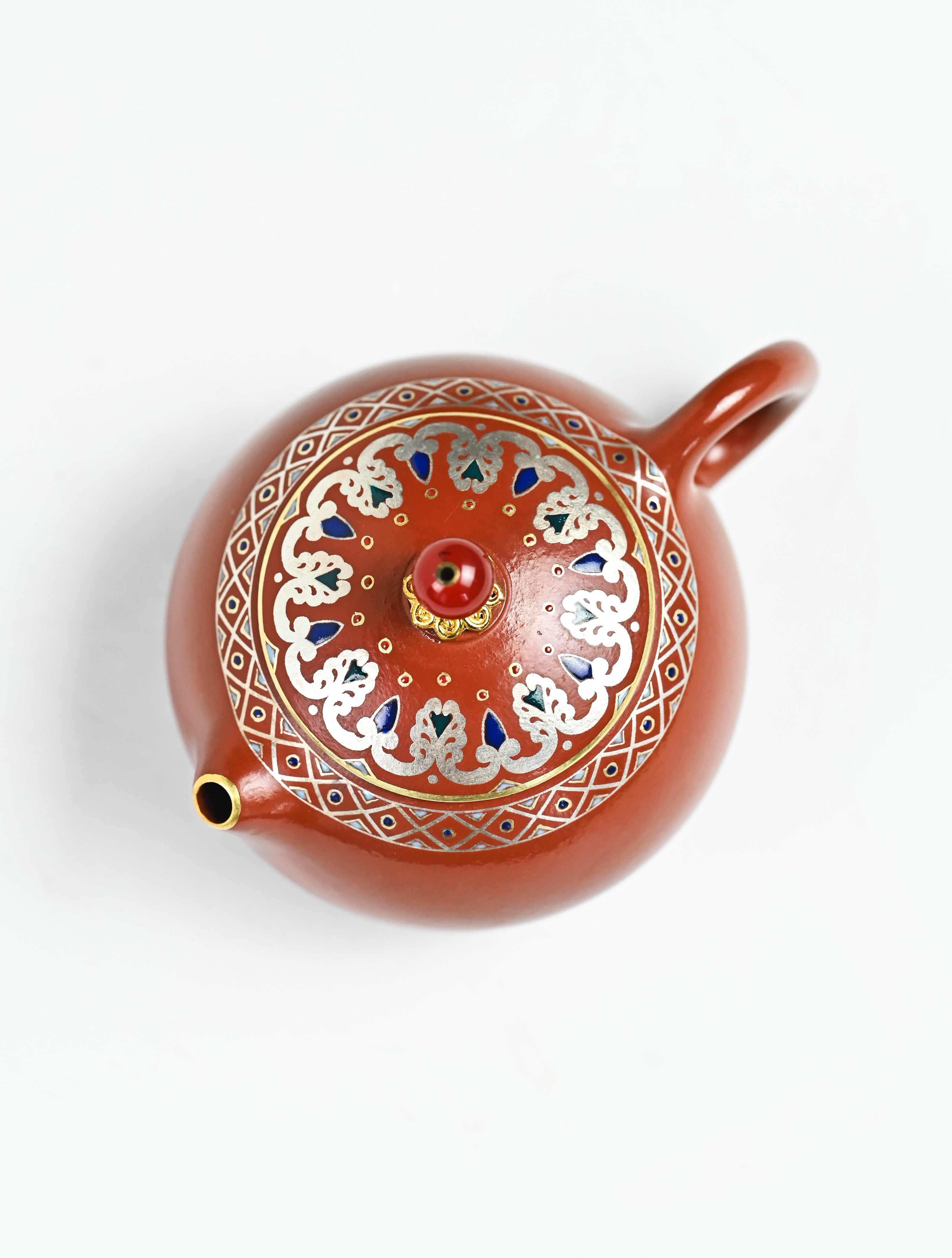 YANYOO handmade Yixing teapot featuring Shuimo polish technique and delicate Falangcai, product top side.