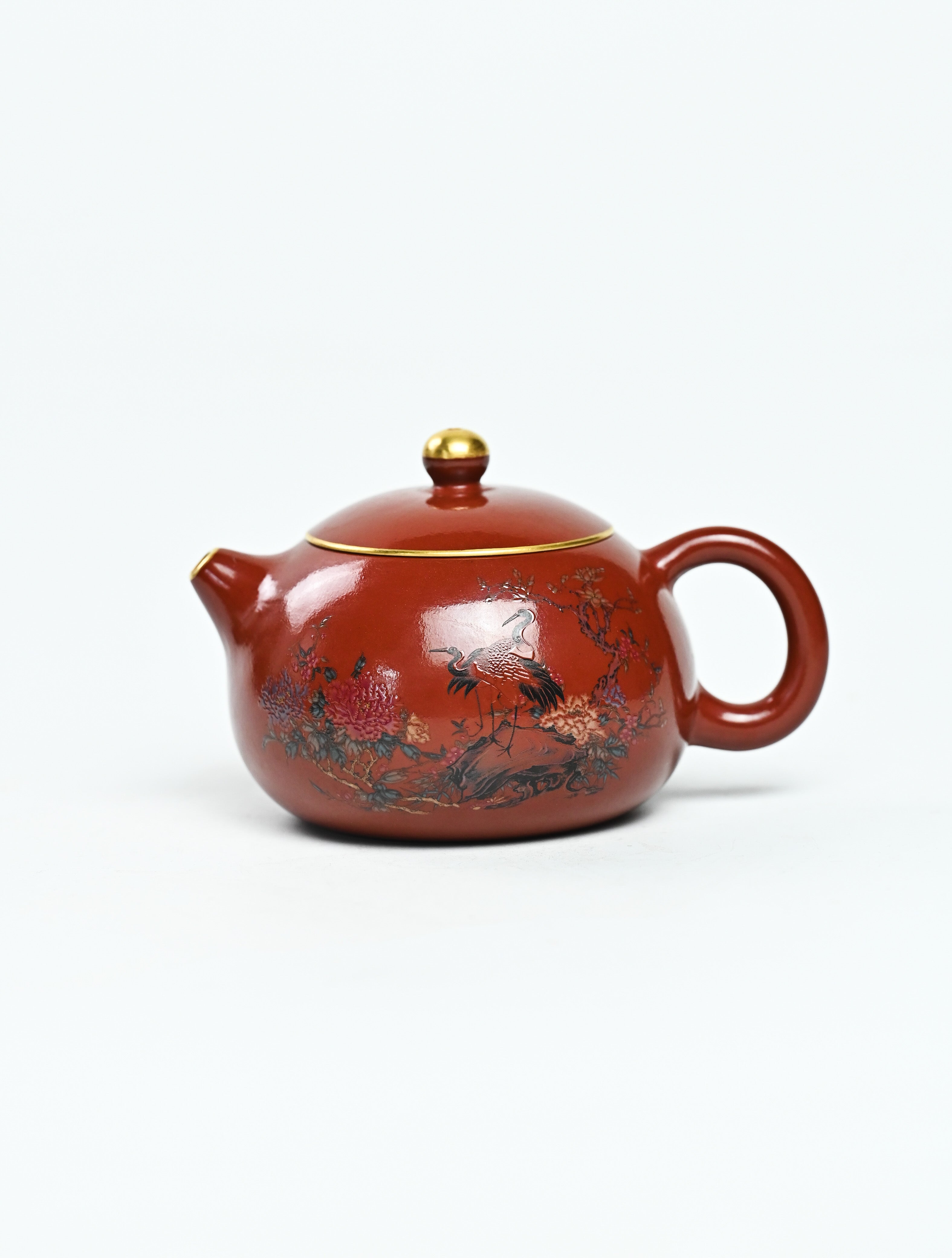 YANYOO handmade Yixing teapot featuring Shuimo polish technique and delicate painting of crane-and-flower motif, product left side.