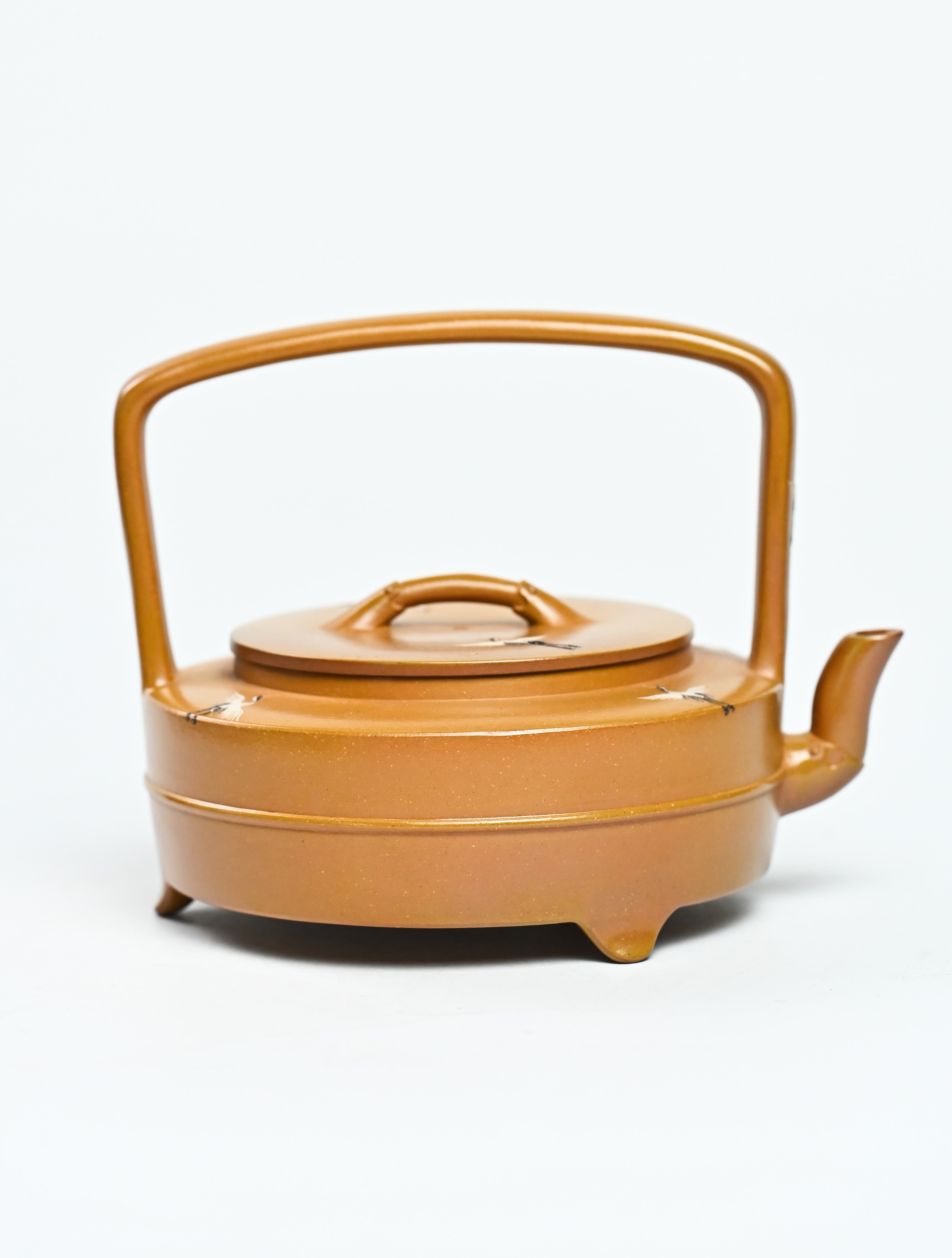 YANYOO handmade wood-fired Yixing teapot featuring hand-painted cloud-and-crane motif and lifting handle, product right side.