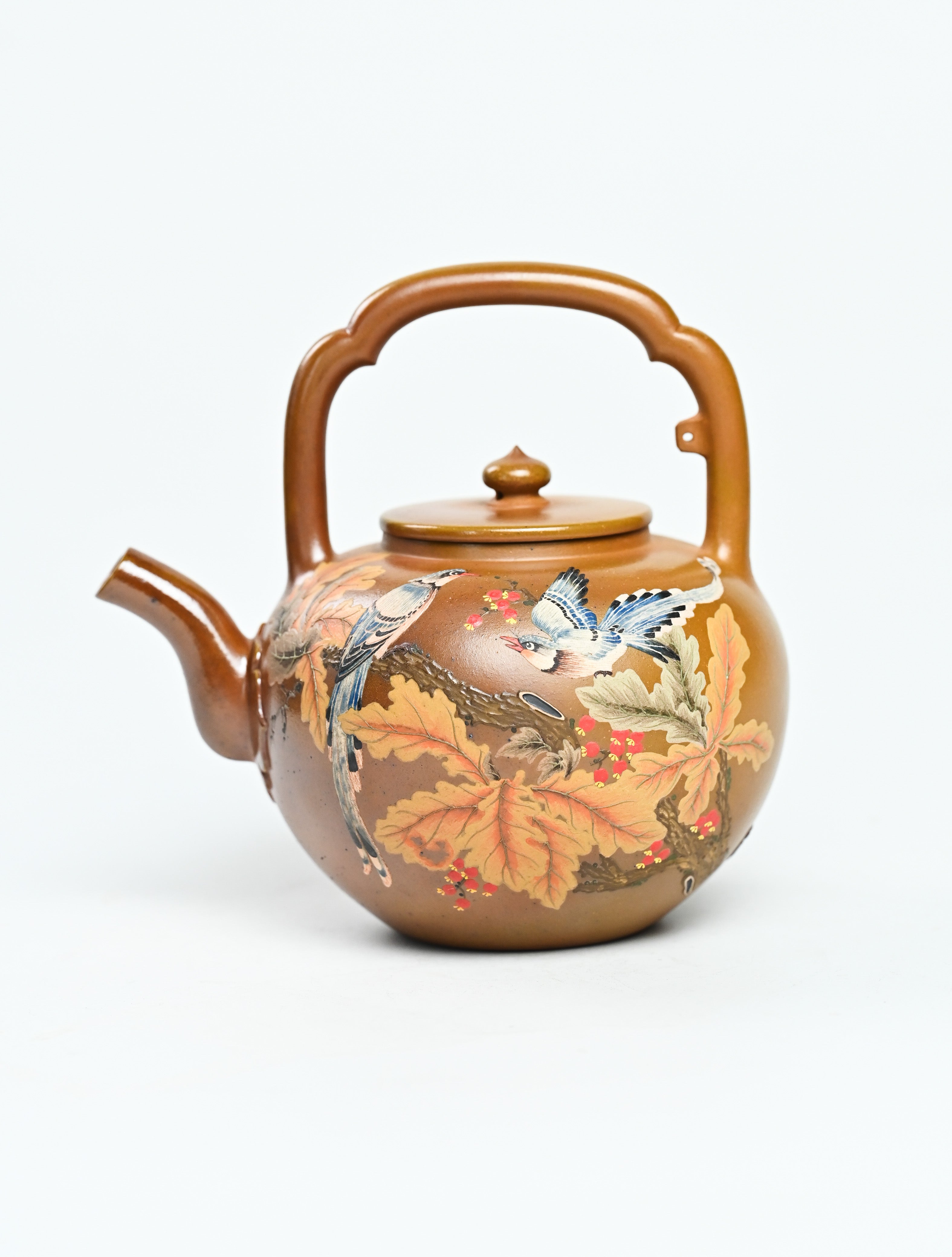 YANYOO handmade wood-fired Yixing teapot featuring hand-painted floral-and-bird motif and lifting handle, product left side.