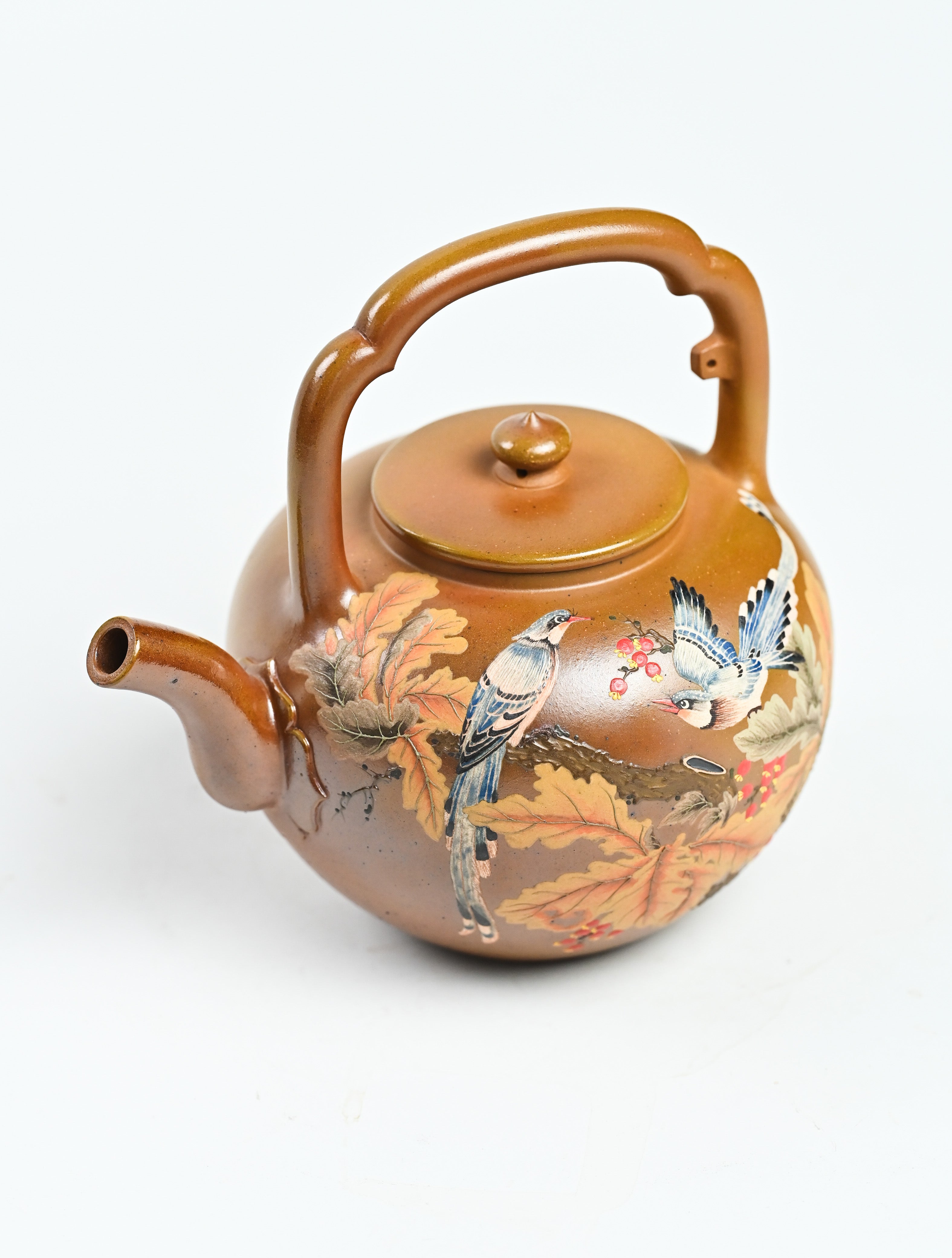 YANYOO handmade wood-fired Yixing teapot featuring hand-painted floral-and-bird motif and lifting handle, product top side.