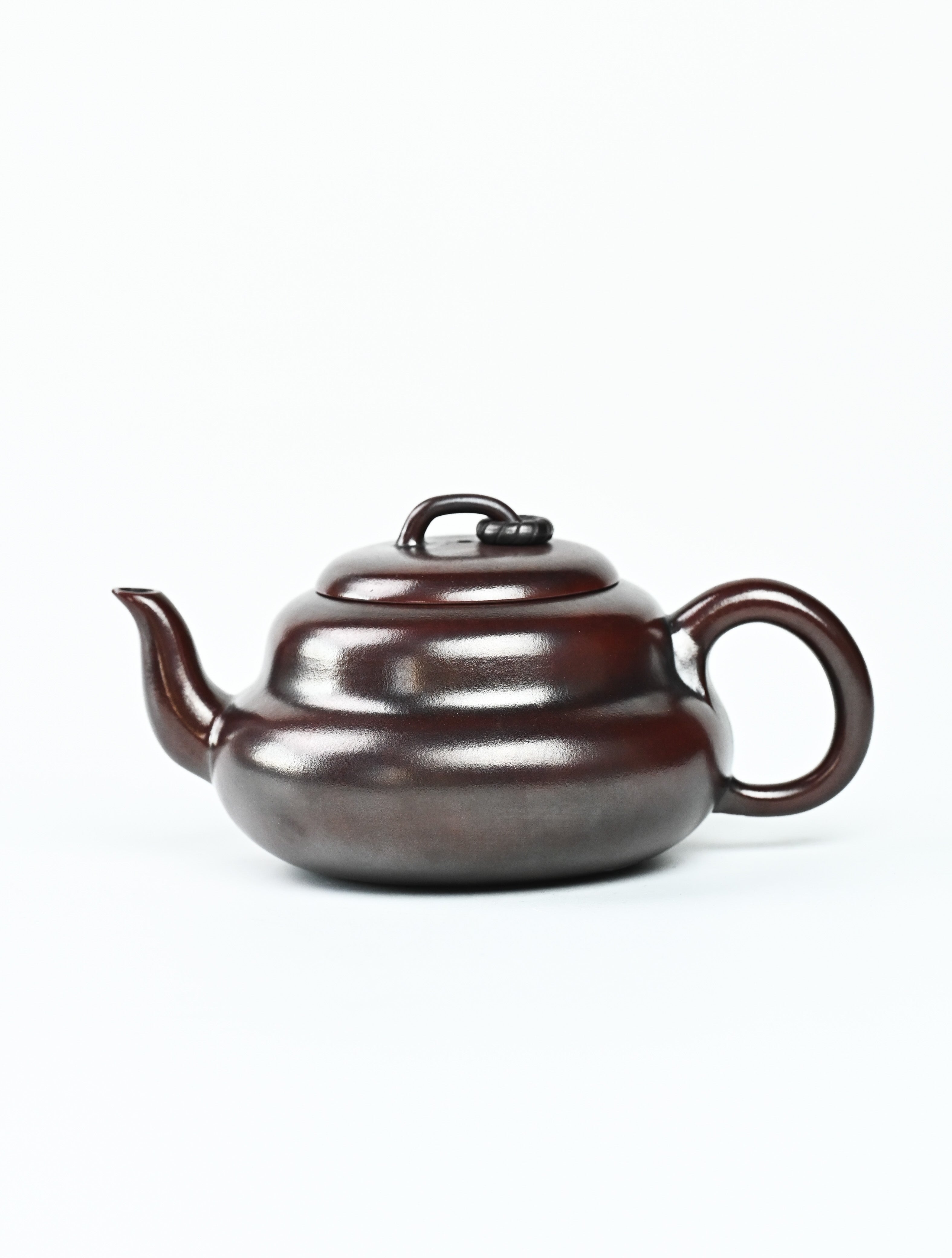 YANYOO handmade Yixing teapot featuring aged Wuni clay and cute gourd shaped, product left side.