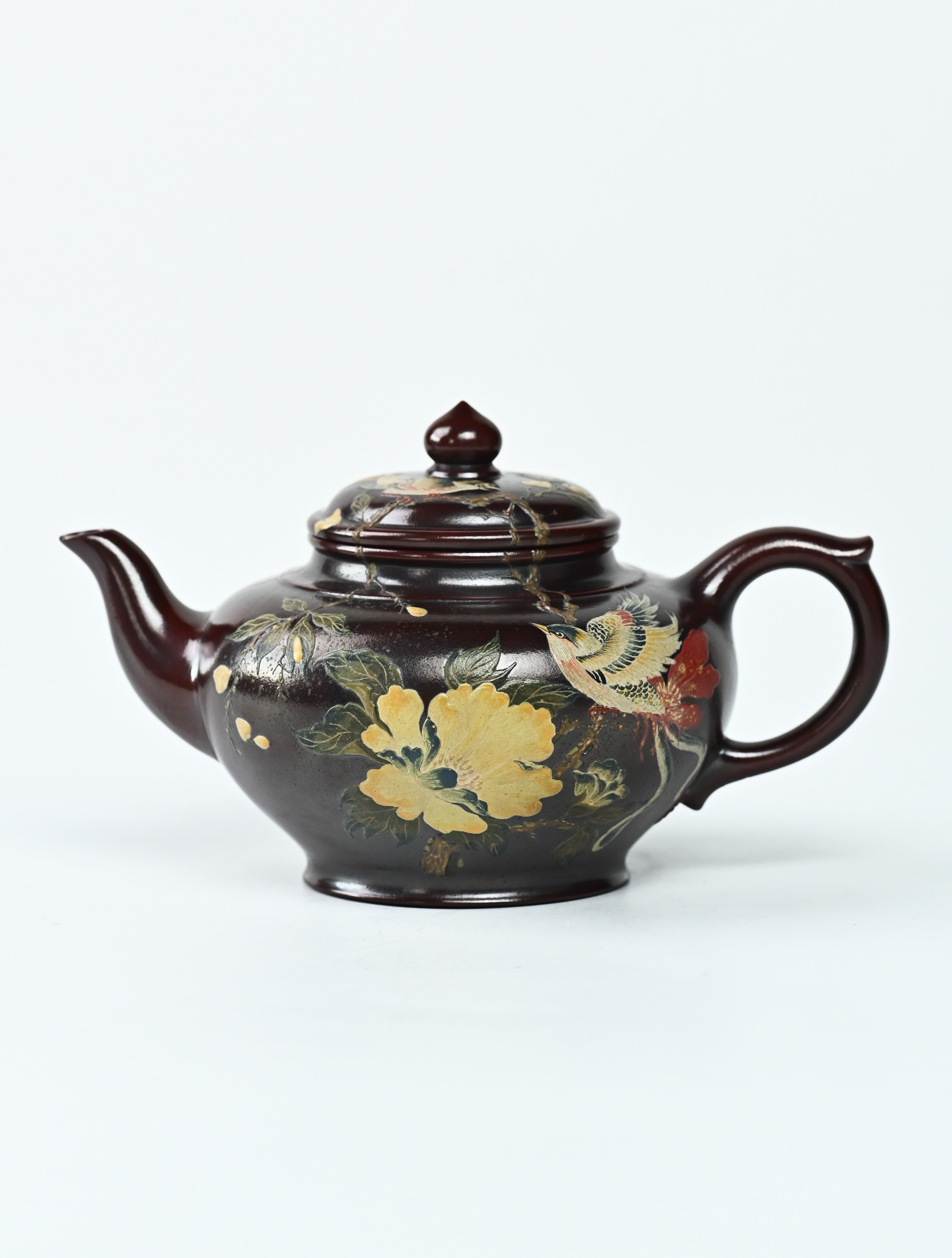 YANYOO handmade Yixing teapot featuring aged Wuni clay, bird-and-flower clay painting, Xiao Ying, product left side.