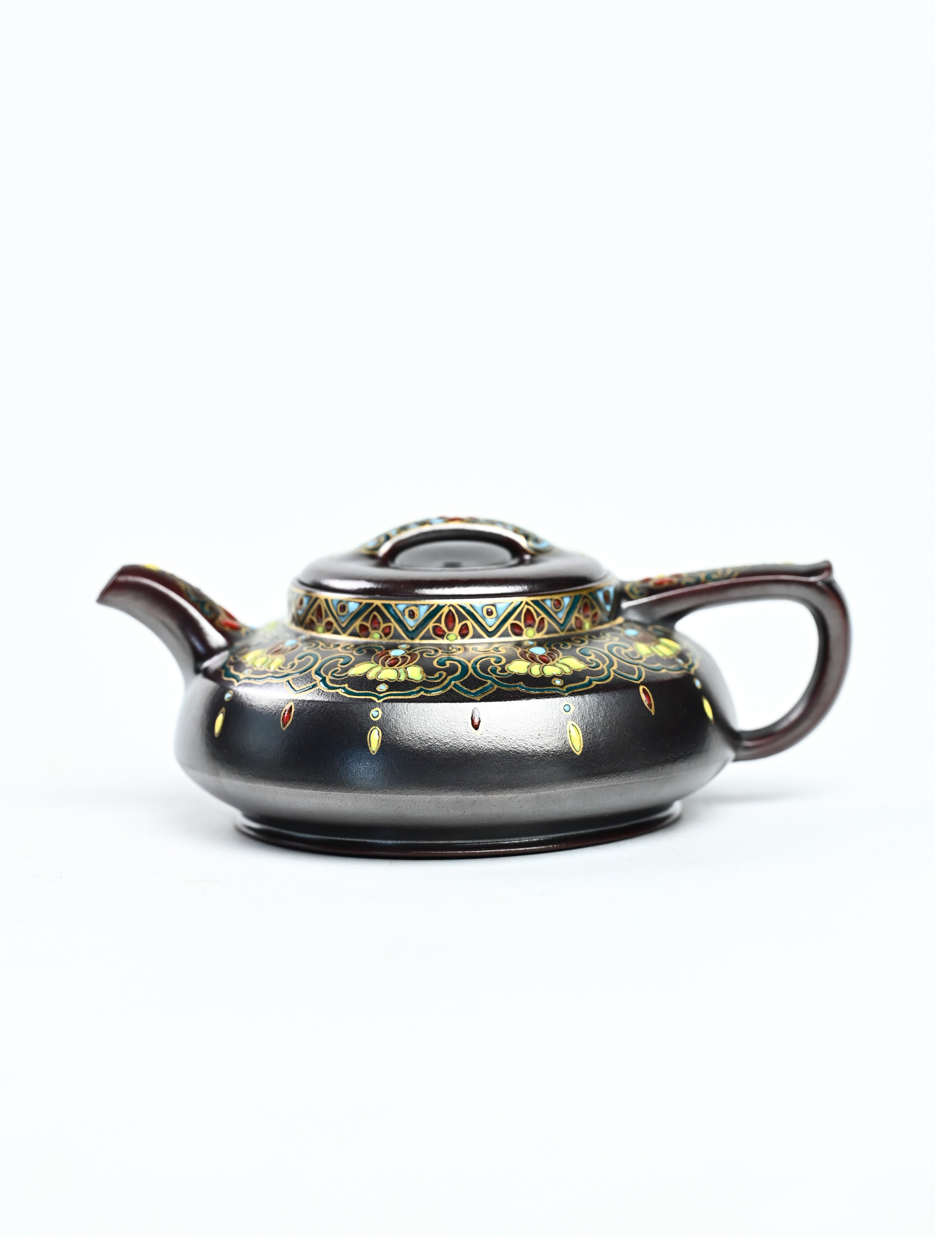 YANYOO handmade Yixing teapot featuring aged Wuni clay and delicate Falangcai, product left side.