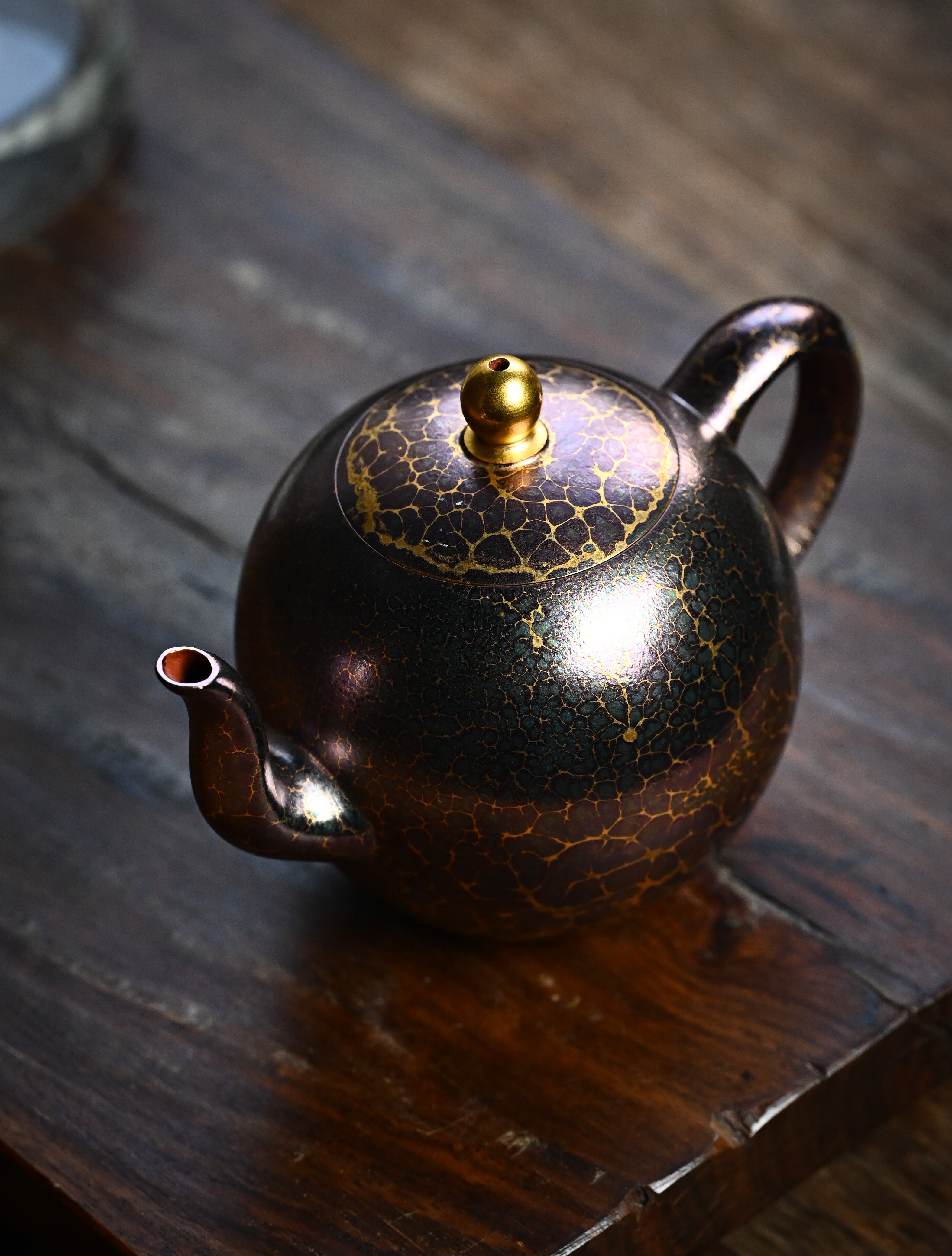 YANYOO handmade Yixing teapot featuring Feather-Plume firing technique, Mei Ren Jian purple, lifestyle left side.