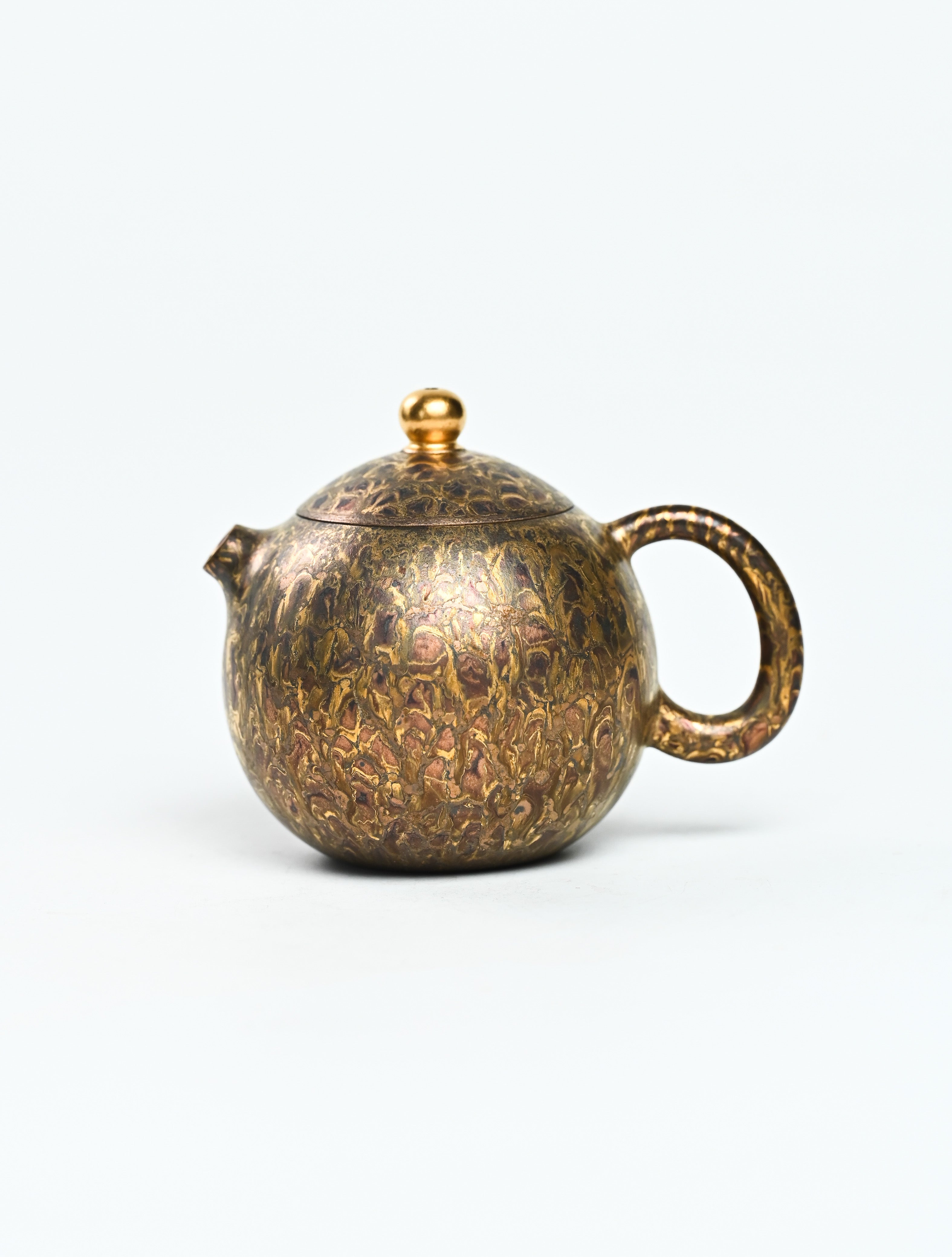 YANYOO handmade Yixing teapot featuring Feather-Plume firing technique, Dragon Egg, product left side.