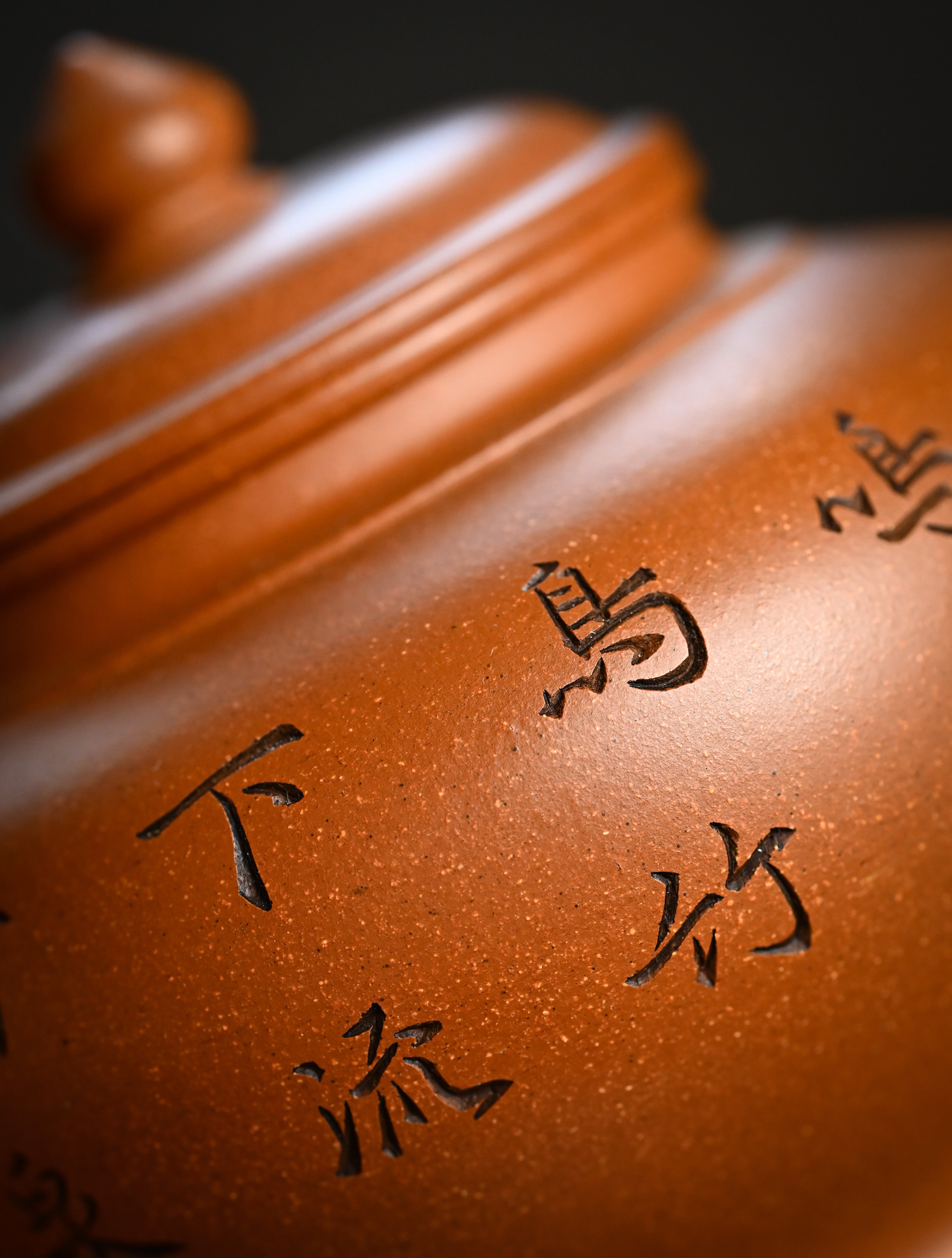 YANYOO handmade Yixing teapot featuring Yucheng Kiln Duanni clay and delicate engravings, Xiao Ying, lifestyle detail rear side.