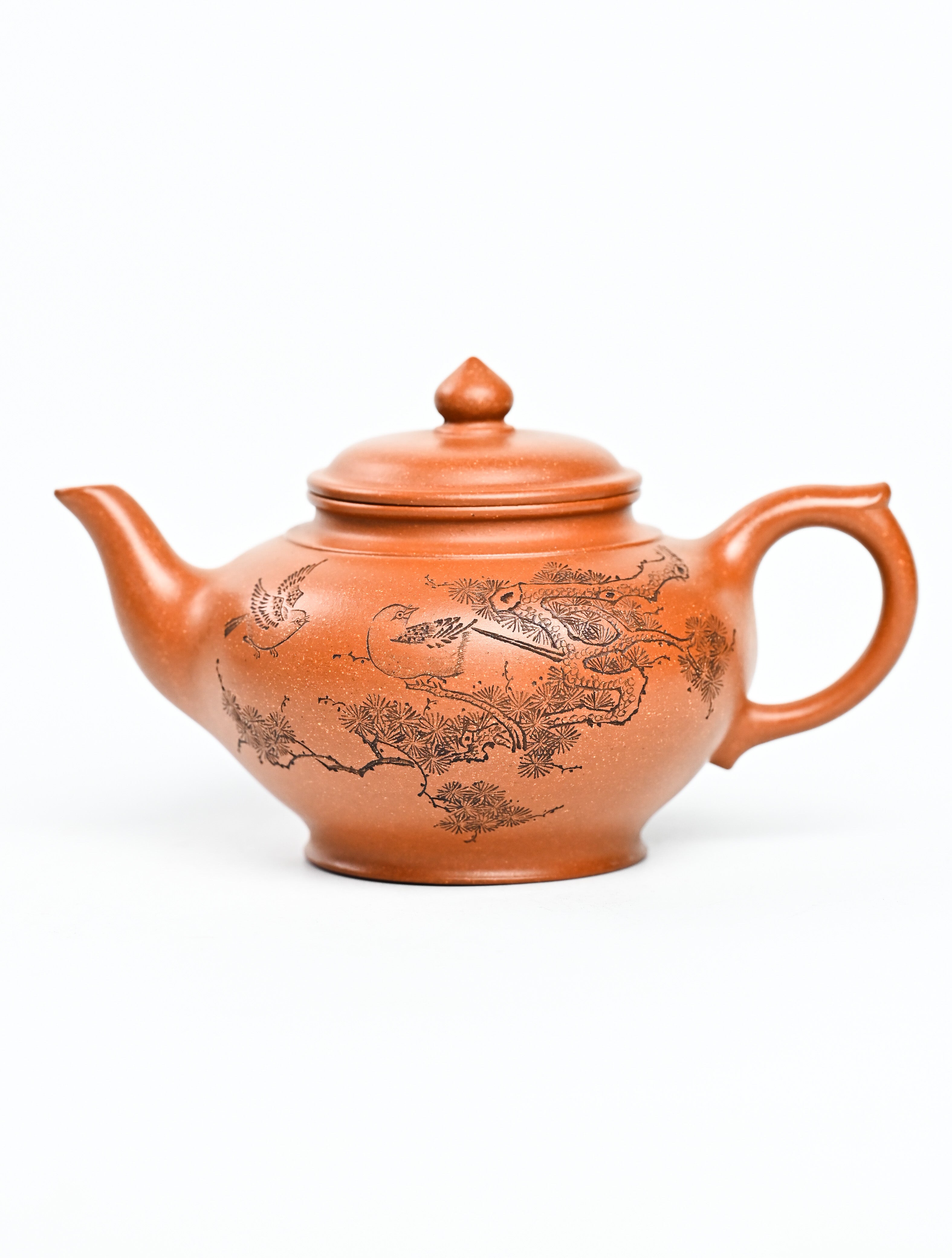 YANYOO handmade Yixing teapot featuring Yucheng Kiln Duanni clay and delicate engravings, Xiao Ying, product left side.