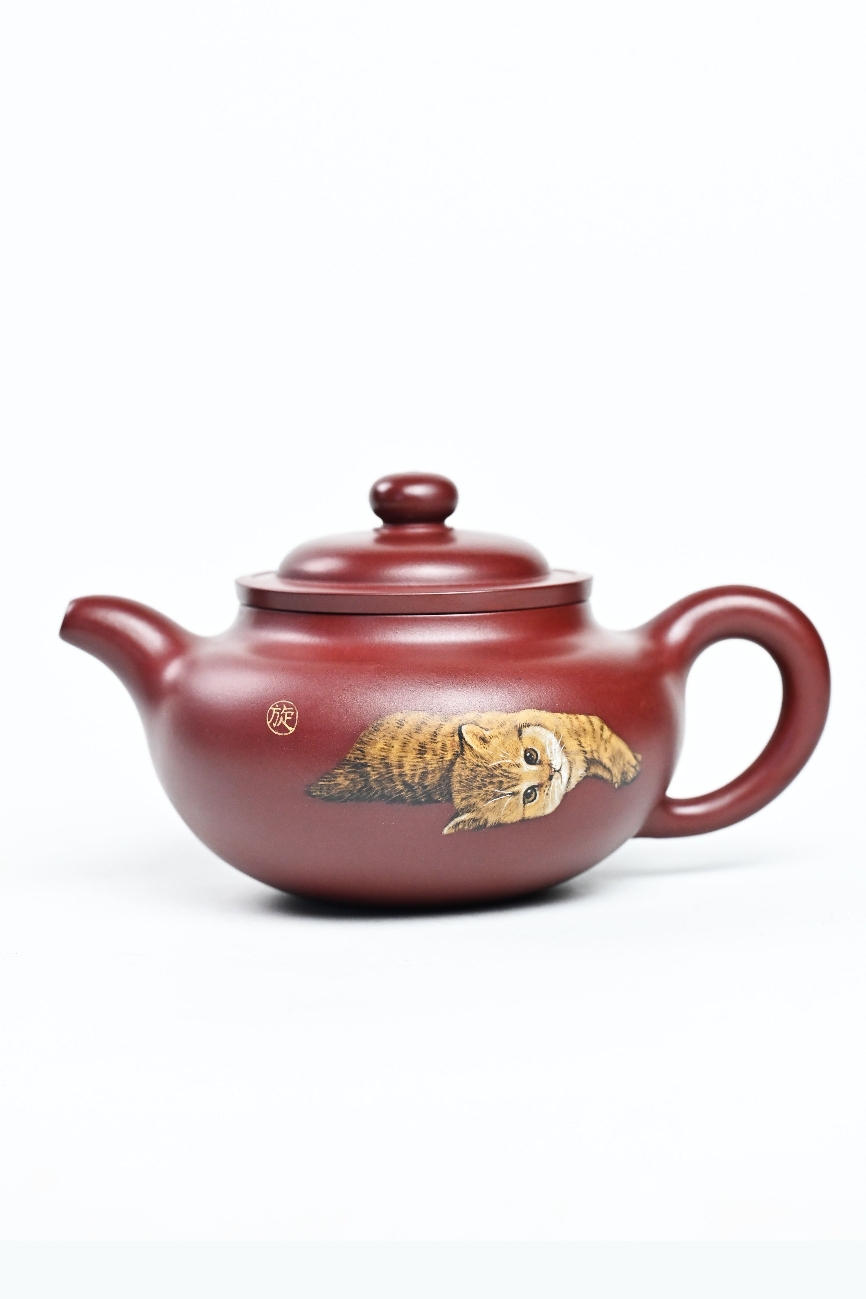 Handmade YANYOO Yixing teapot featuring Hong Pi Long clay and embedded clay painting, product left side.