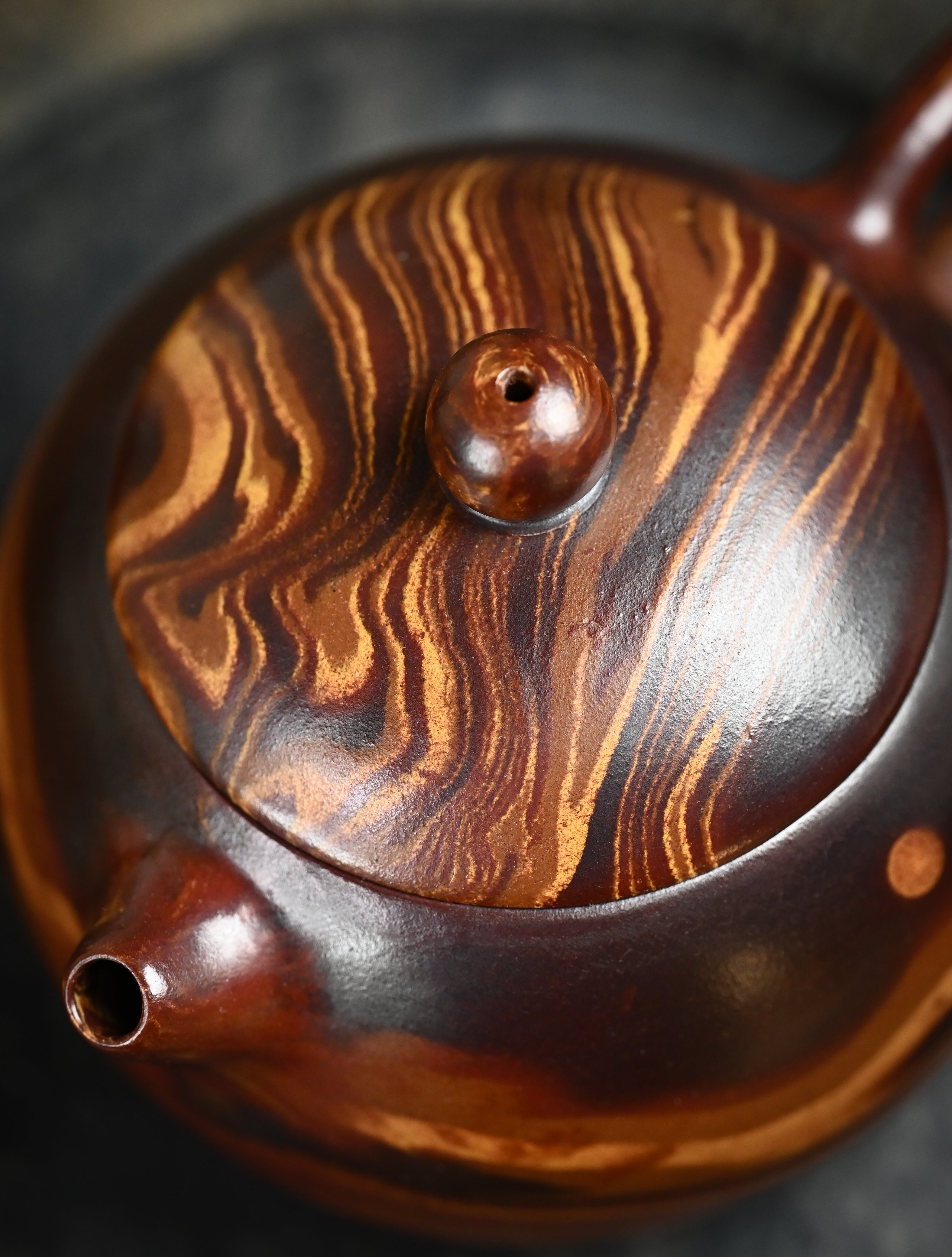 YANYOO handmade Yixing teapot featuring signature Wuni clay and Zisha clay blending technique, Xi Shi, lifestyle detail top side.