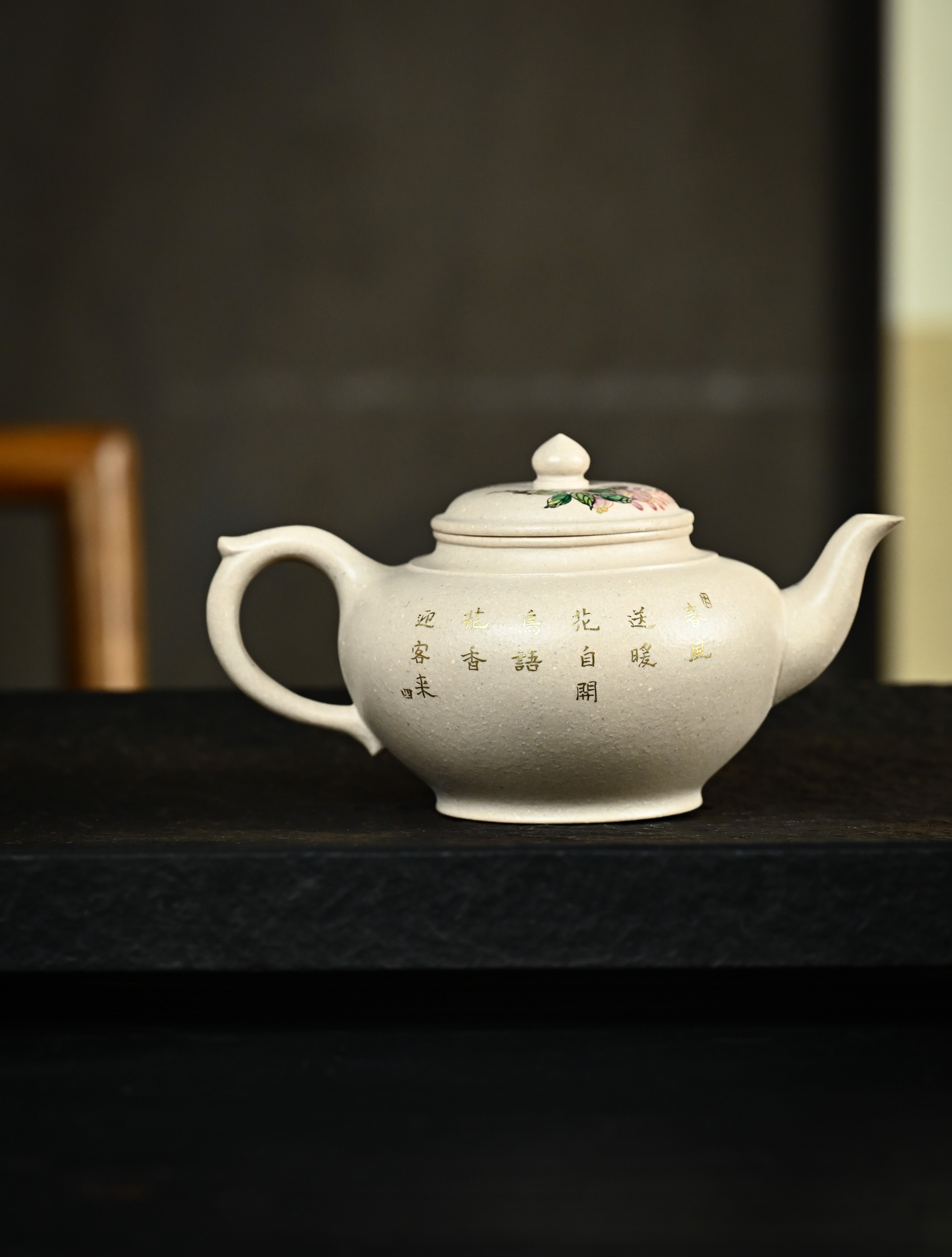 YANYOO handmade Yixing teapot featuring suet white jade Duanni clay and delicate bird-and-peach themed clay painting, Xiao Ying, lifestyle wide-angle right side.