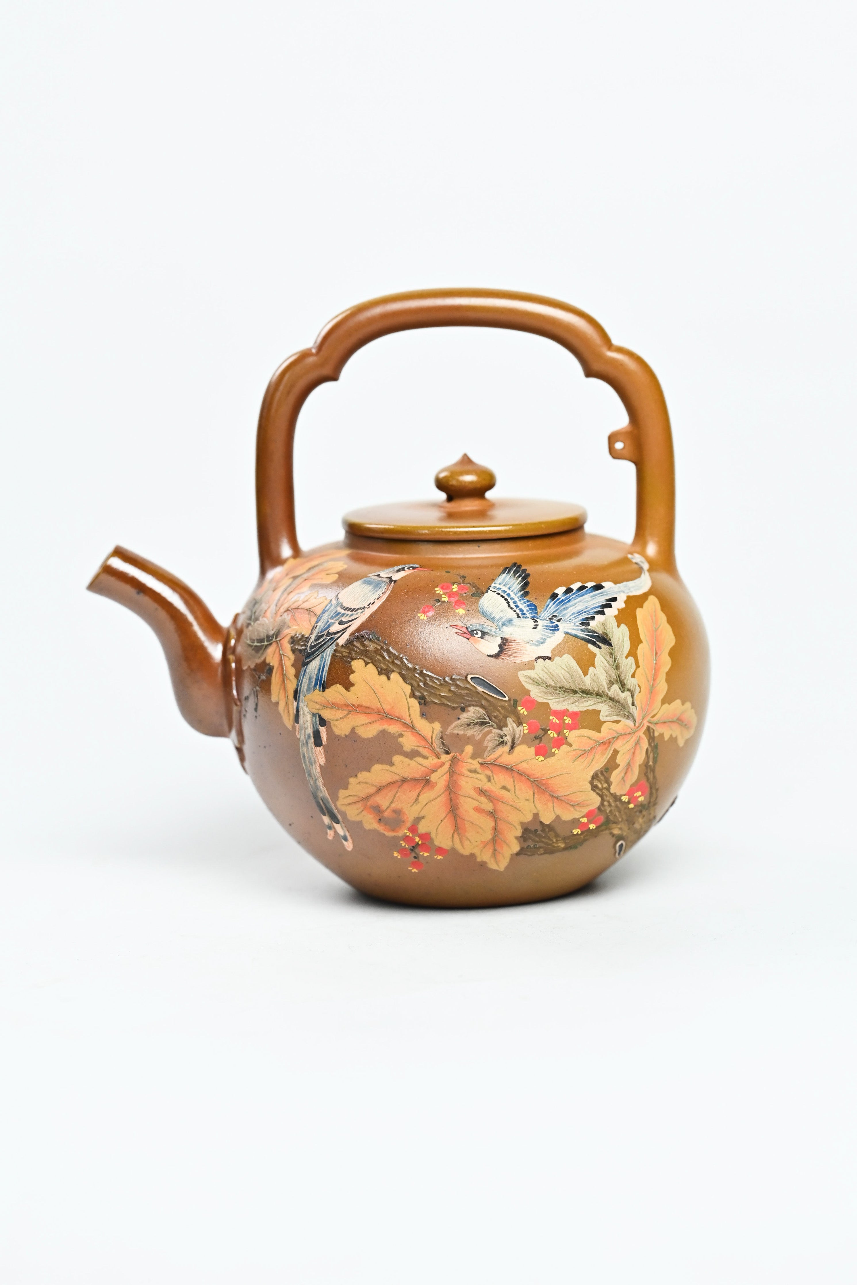 Handmade YANYOO Yixing teapot featuring hand-painted floral and bird motif, product left side.