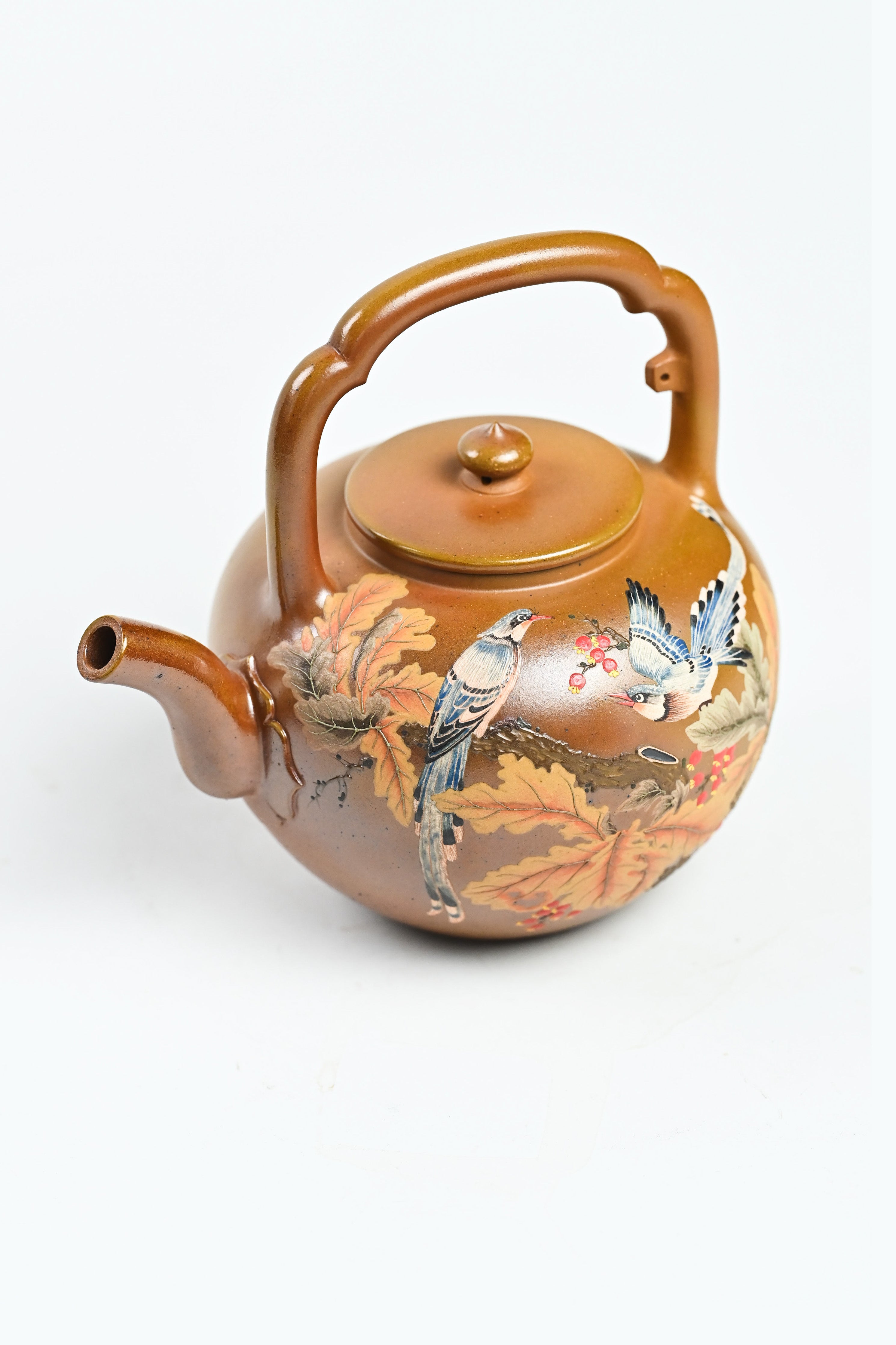 Handmade YANYOO Yixing teapot featuring hand-painted floral and bird motif, product top side.