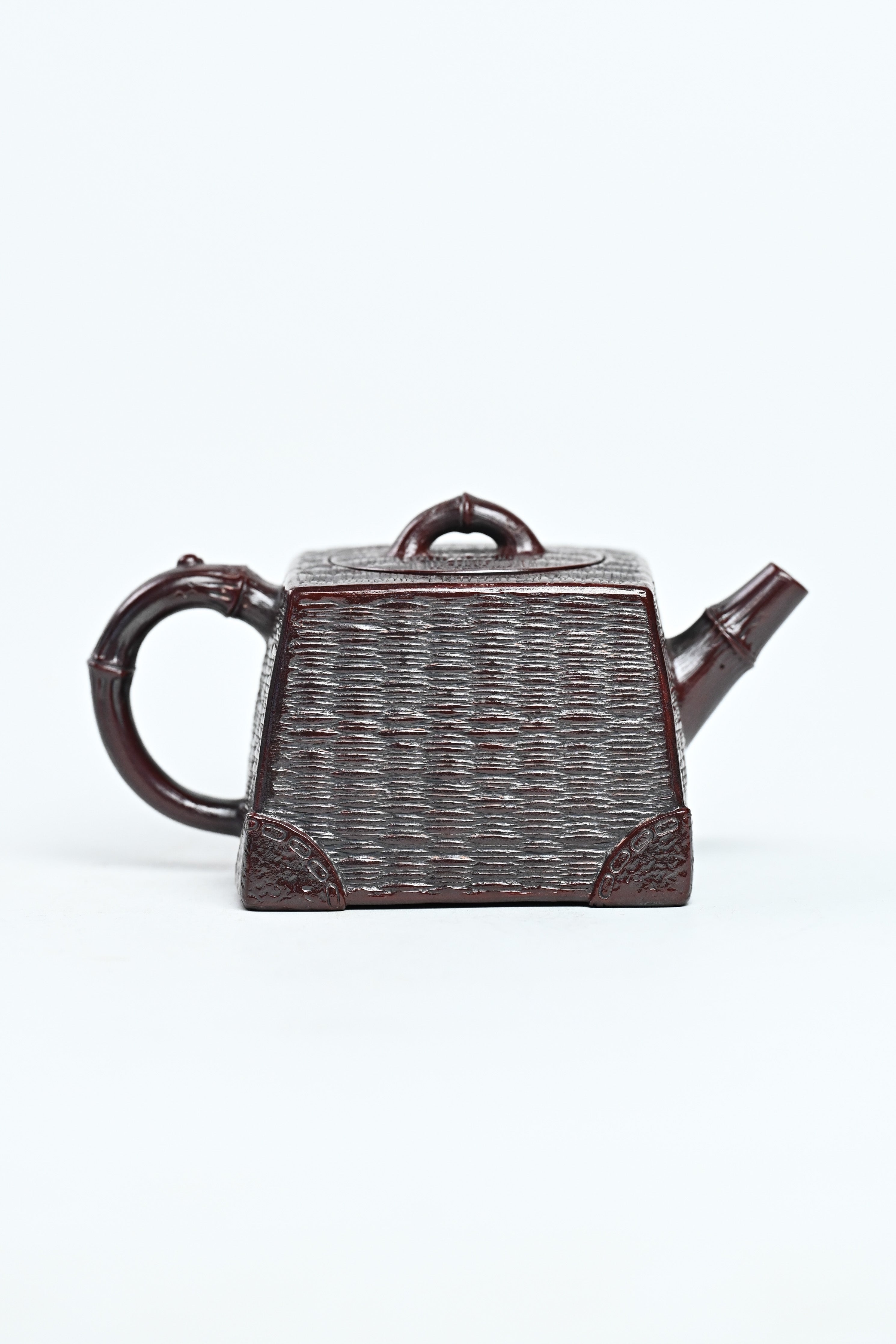 Handcrafted YANYOO Yixing teapot featuring aged Wuni clay and bamboo weaving technique, product right side.