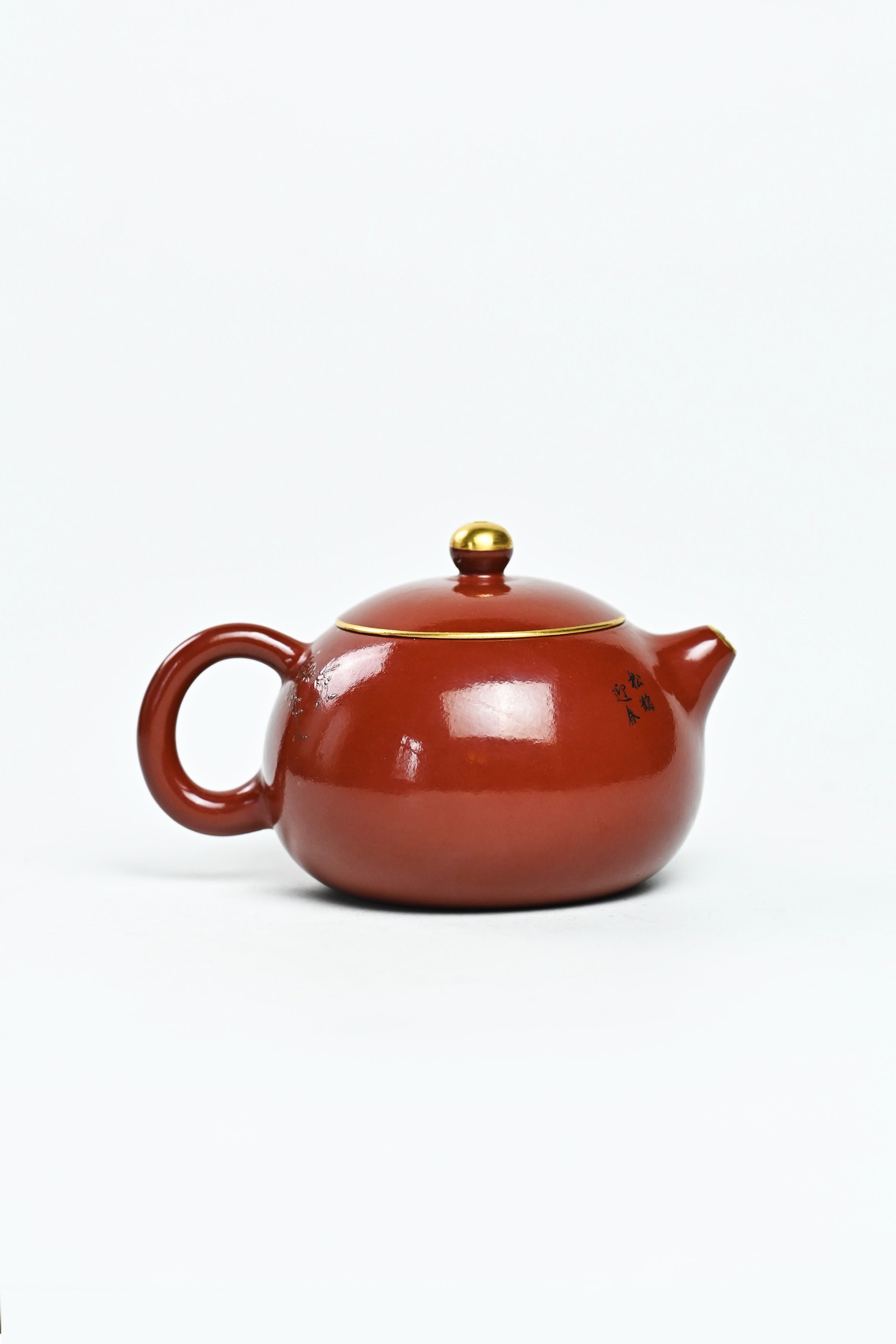 Handmade YANYOO Yixing teapot featuring Zhuni clay, hand-painted pattern and water-polished craftsmanship, product right side.