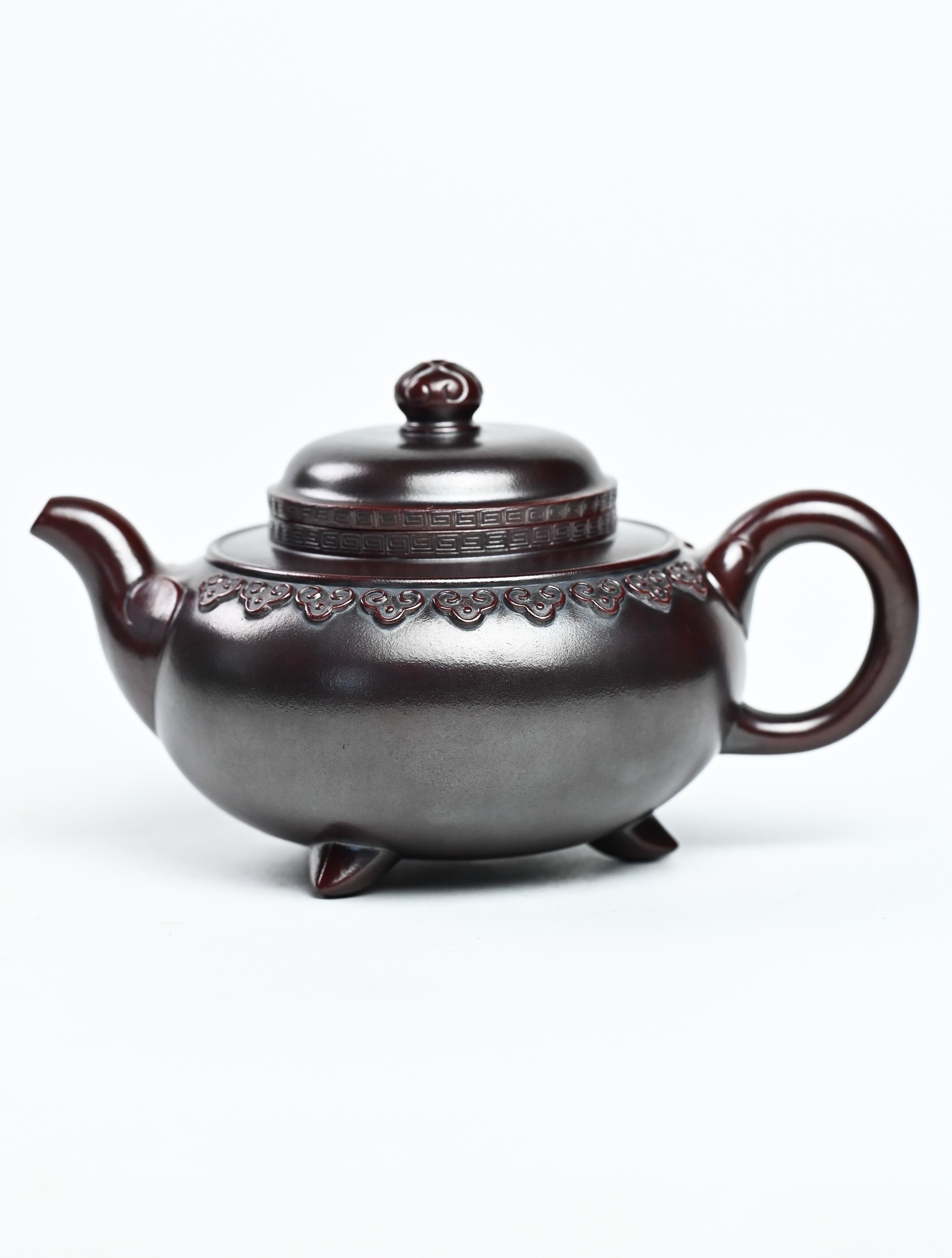 YANYOO handmade Yixing teapot featuring aged Wuni clay and cloud shoulder pattern, Fang Gu Ruyi, product left side.