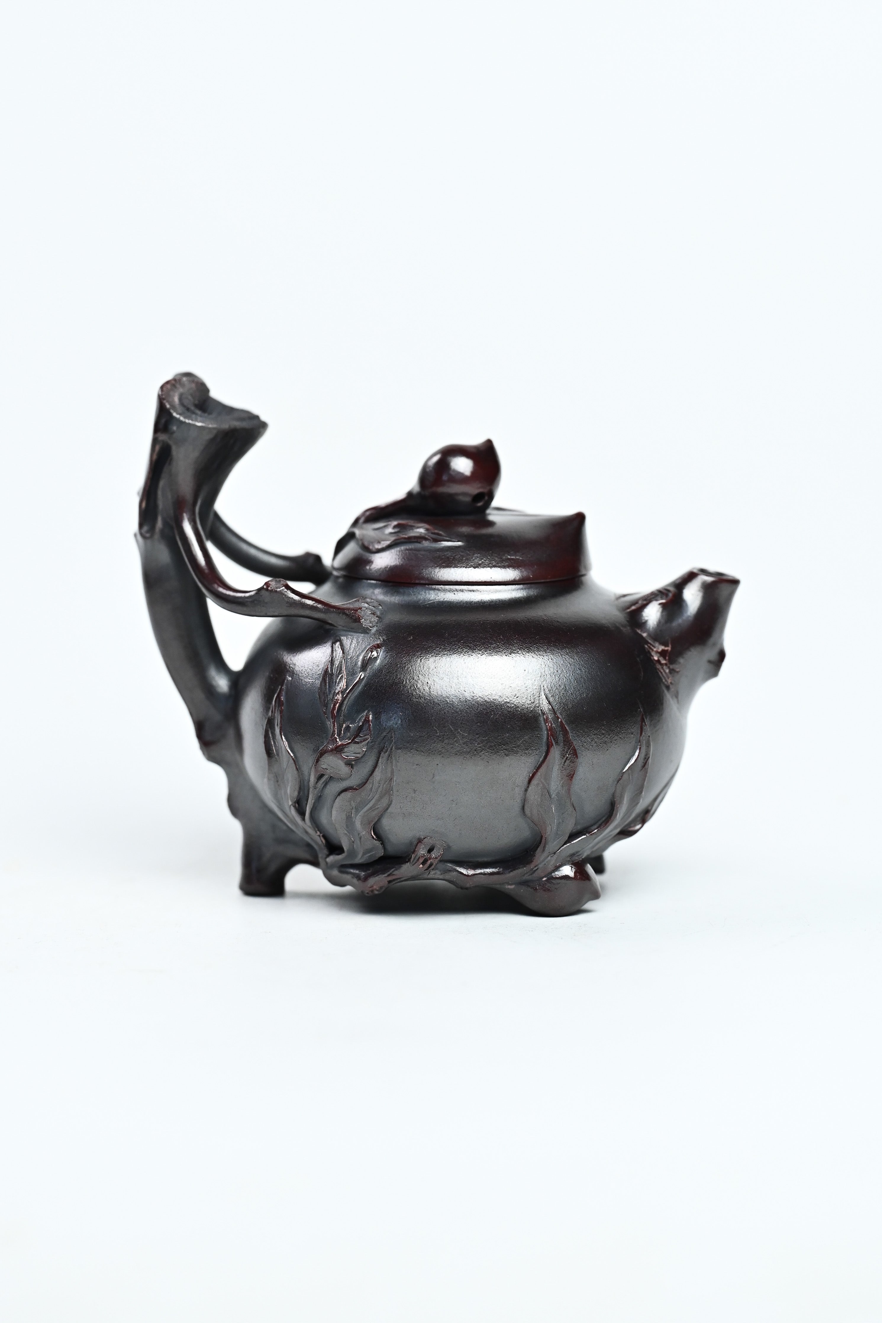 Handmade YANYOO Yixing teapot featuring aged Wuni clay and peach design, product right side.