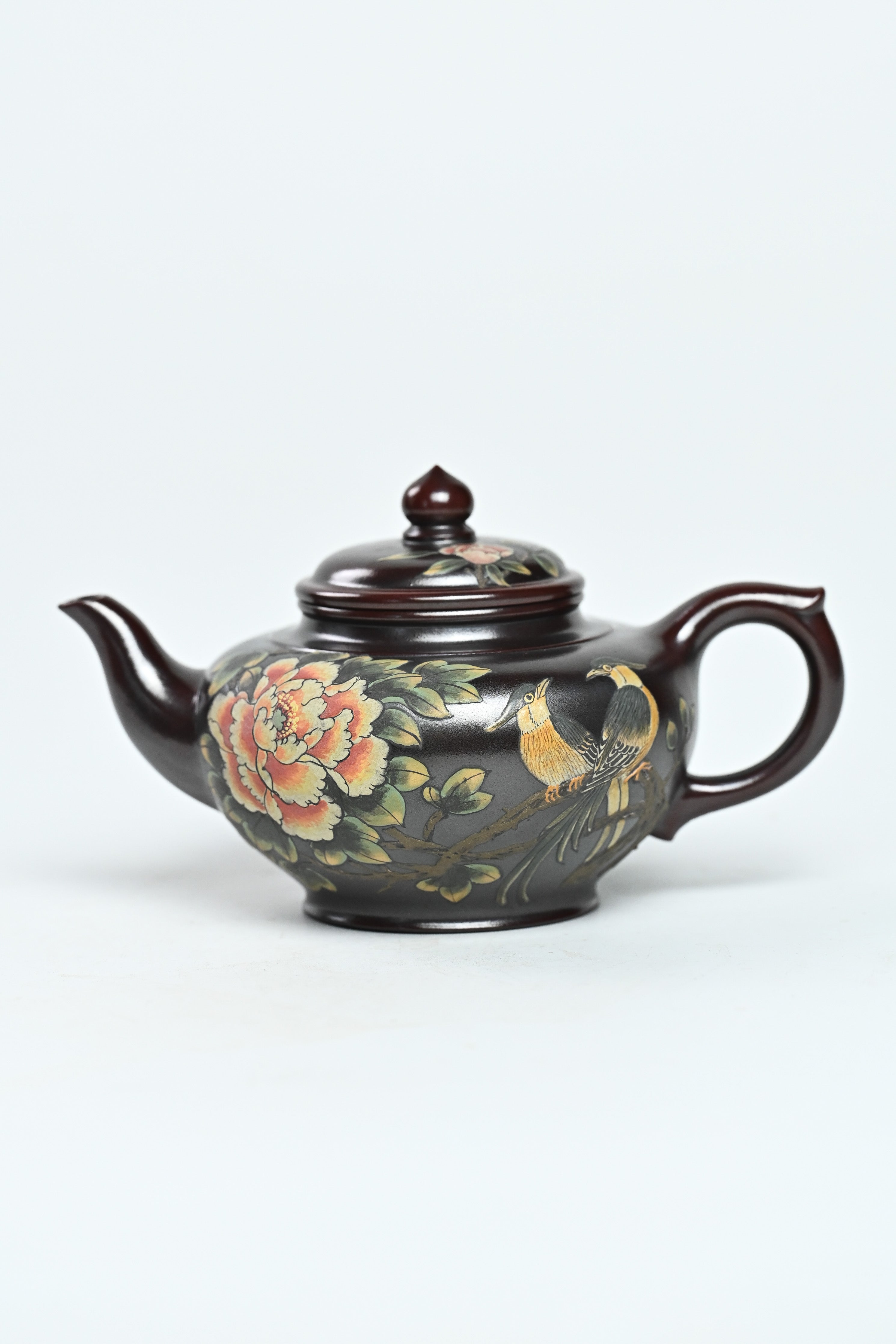 Handmade YANYOO Yixing teapot featuring aged Wuni clay and painting, Xiao Ying, product left side.