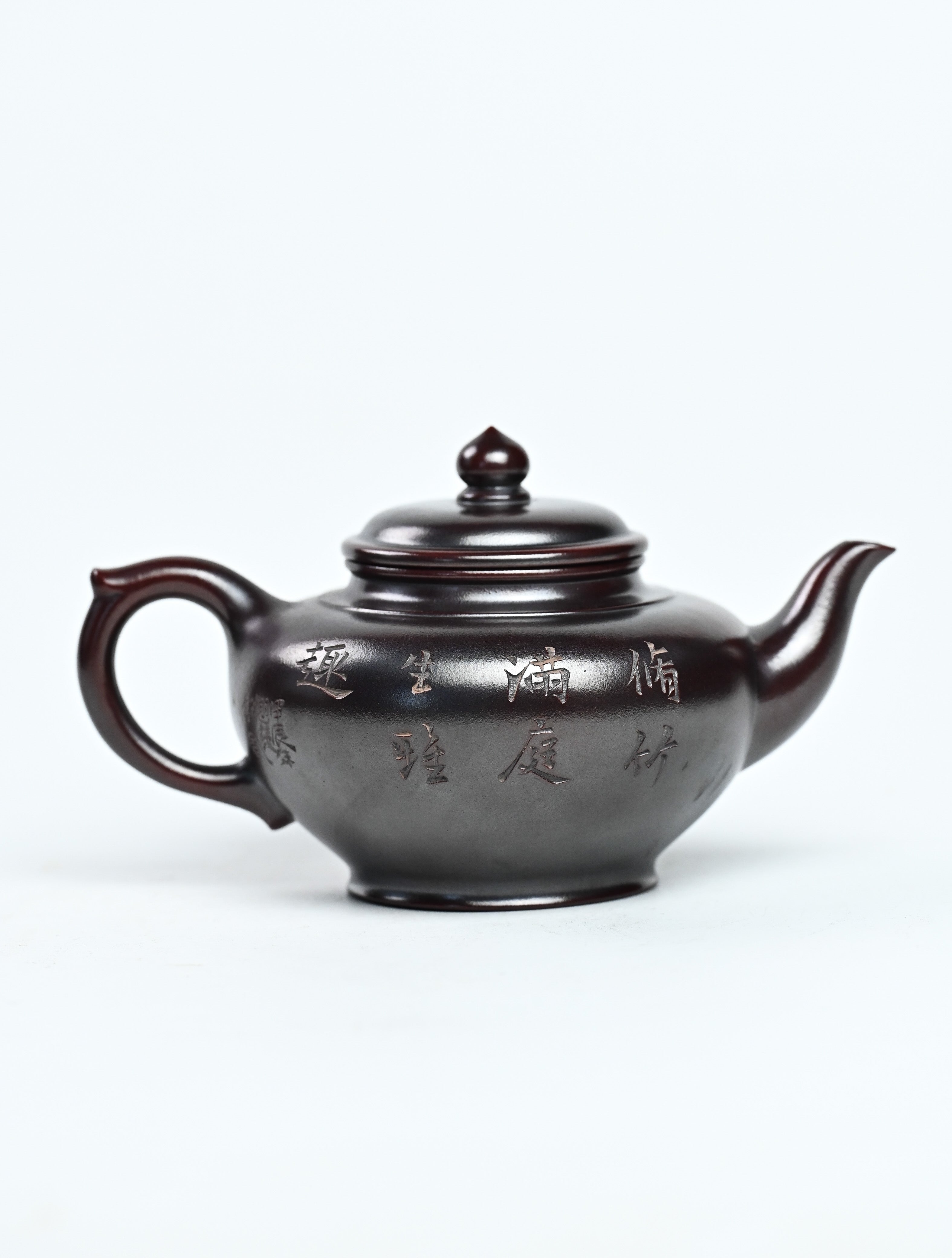 YANYOO handmade Yixing teapot featuring aged Wuni clay and bird engravings, product right side.