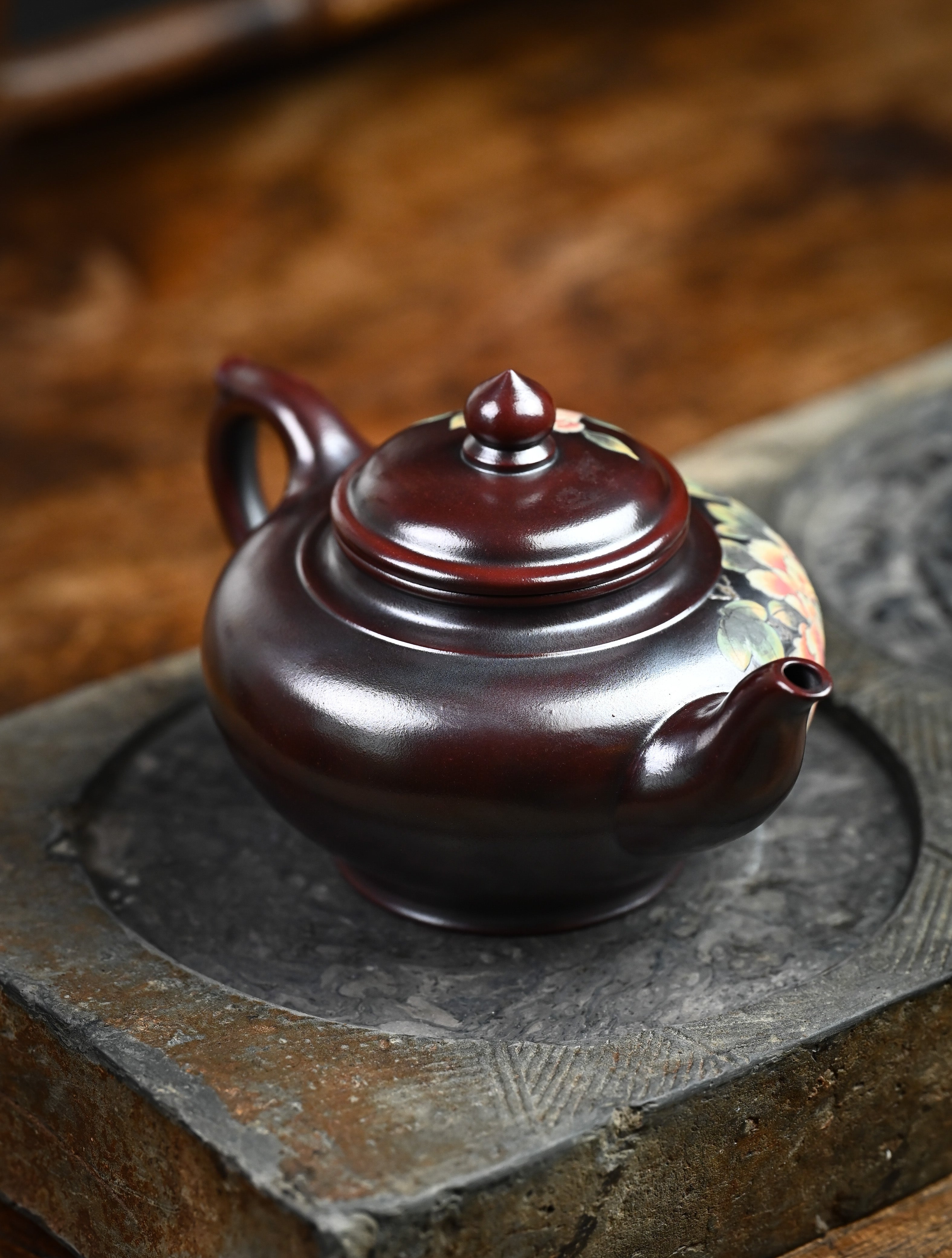 YANYOO handmade Yixing teapot featuring aged Wuni clay and bird-and-flower painting, lifestyle right side.