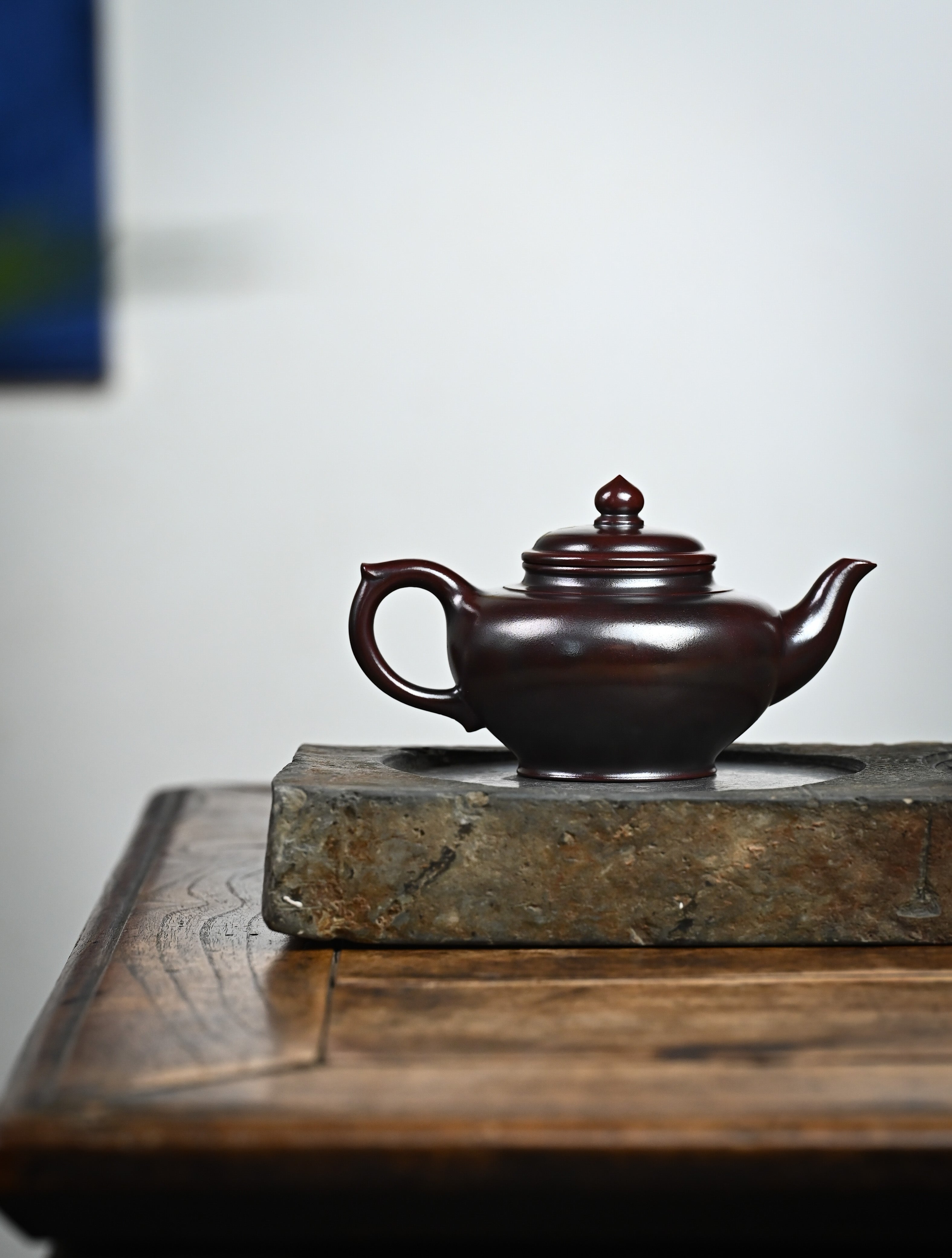 YANYOO handmade Yixing teapot featuring aged Wuni clay and bird-and-flower painting, lifestyle wide-angle right side.