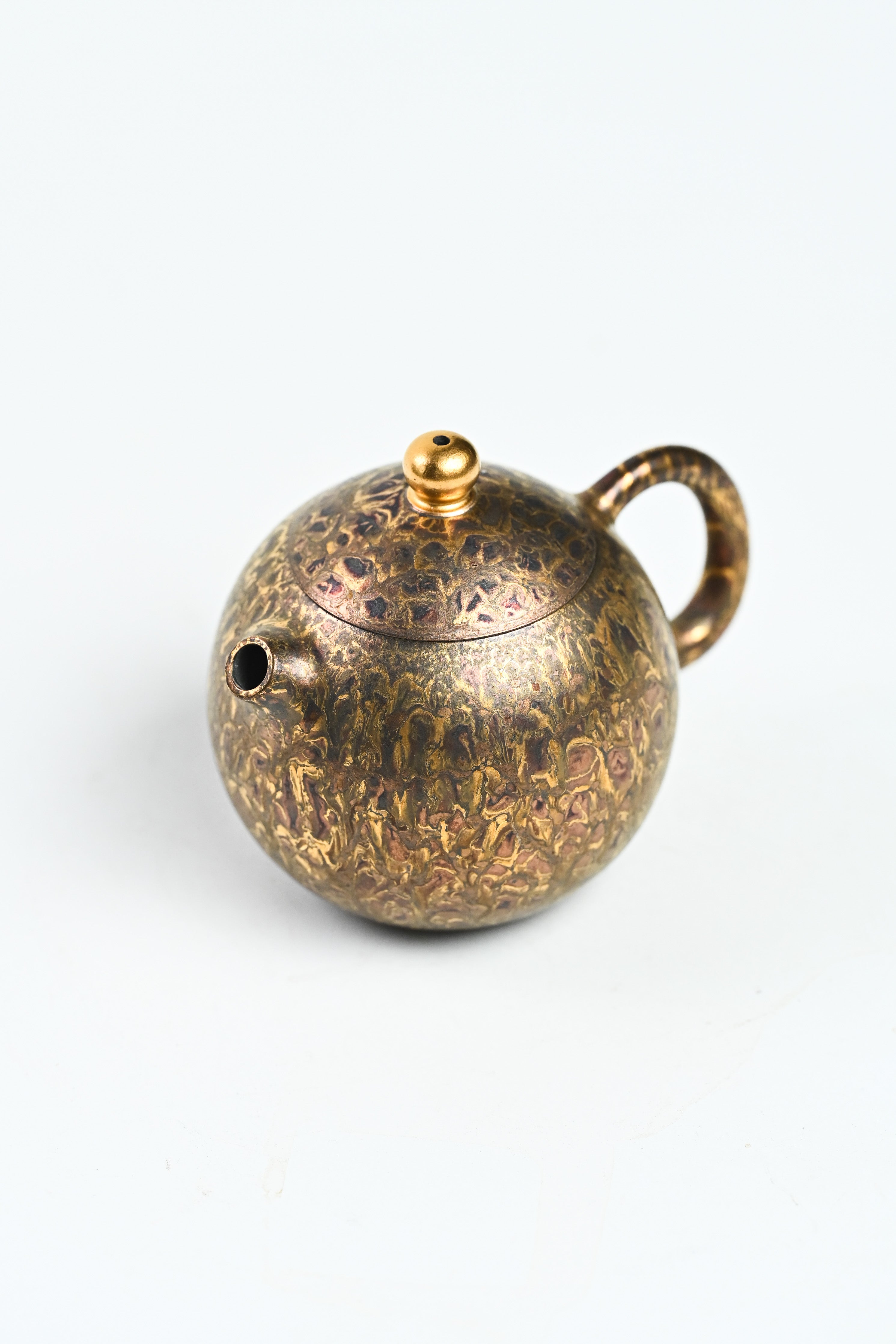 Handmade YANYOO Yixing teapot featuring Feather-Plume firing technique, Long Dan, product top side.