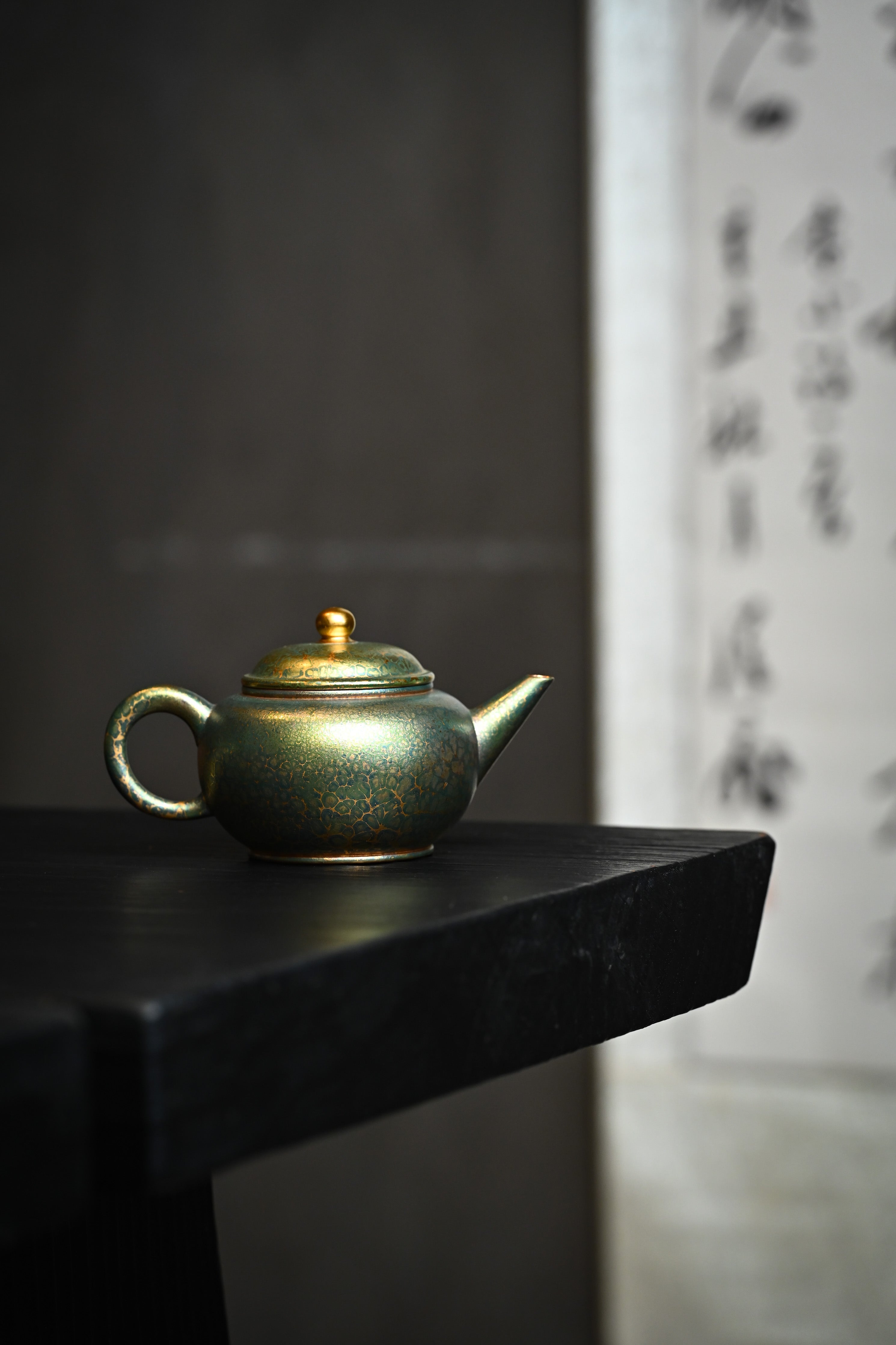 Handmade YANYOO Yixing teapot featuring Feather-Plume firing technique, Shui Ping Matcha, lifestyle wide-angle right side.