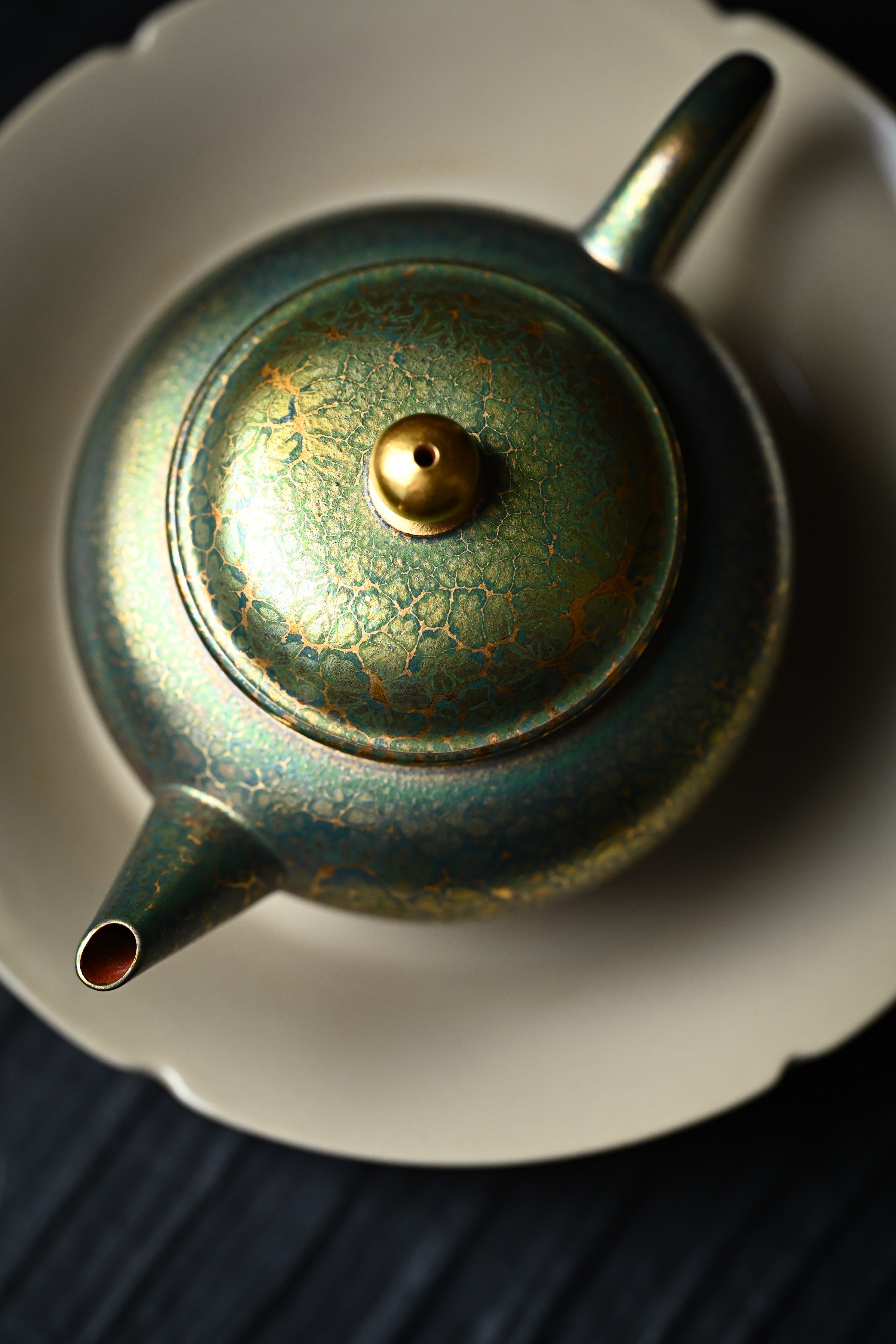 Handmade YANYOO Yixing teapot featuring Feather-Plume firing technique, Shui Ping Matcha, lifestyle detail top side.