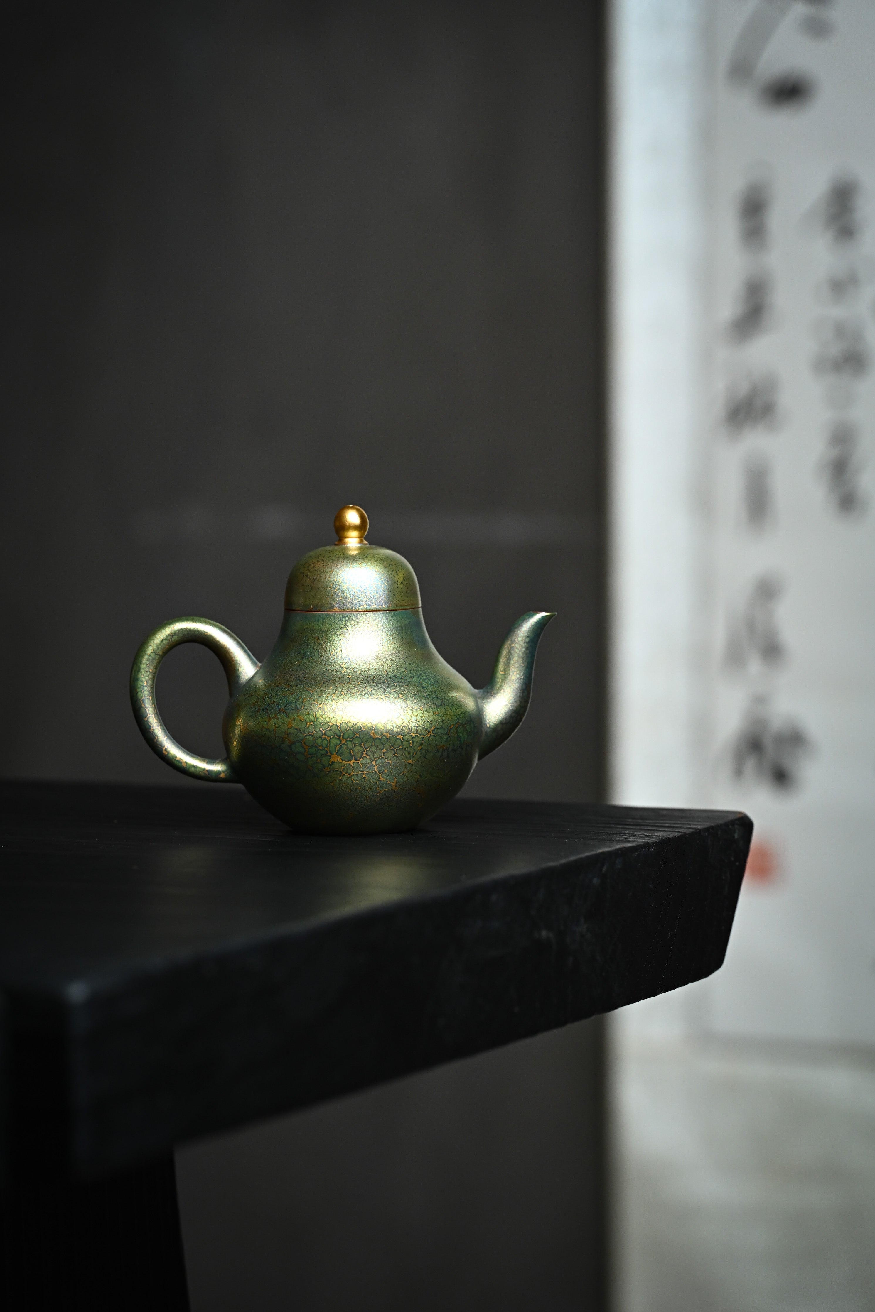 Handmade YANYOO Yixing teapot featuring Feather-Plume firing technique, Si Ting Matcha, lifestyle wide-angle right side.