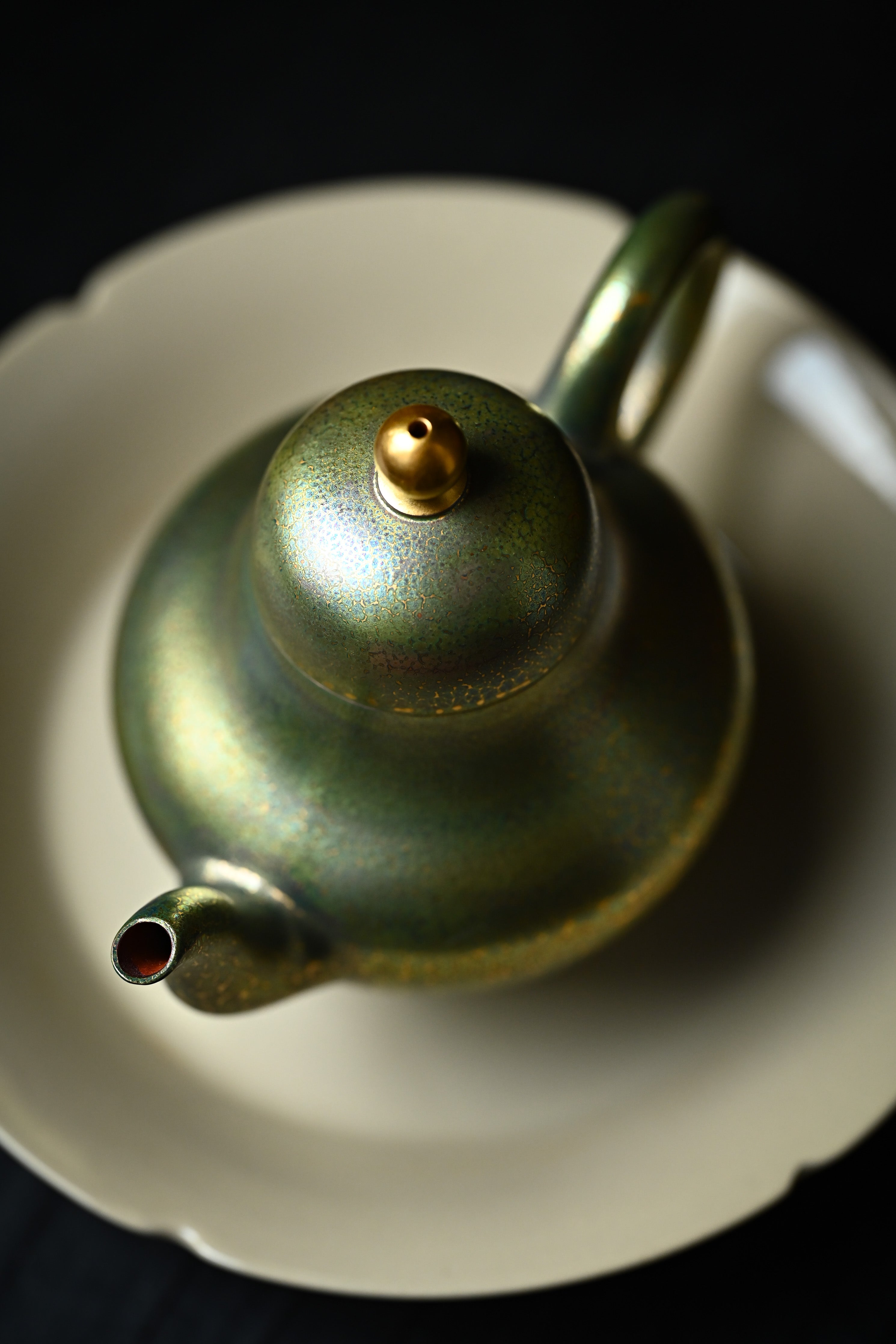 Handmade YANYOO Yixing teapot featuring Feather-Plume firing technique, Si Ting Matcha, lifestyle top side.